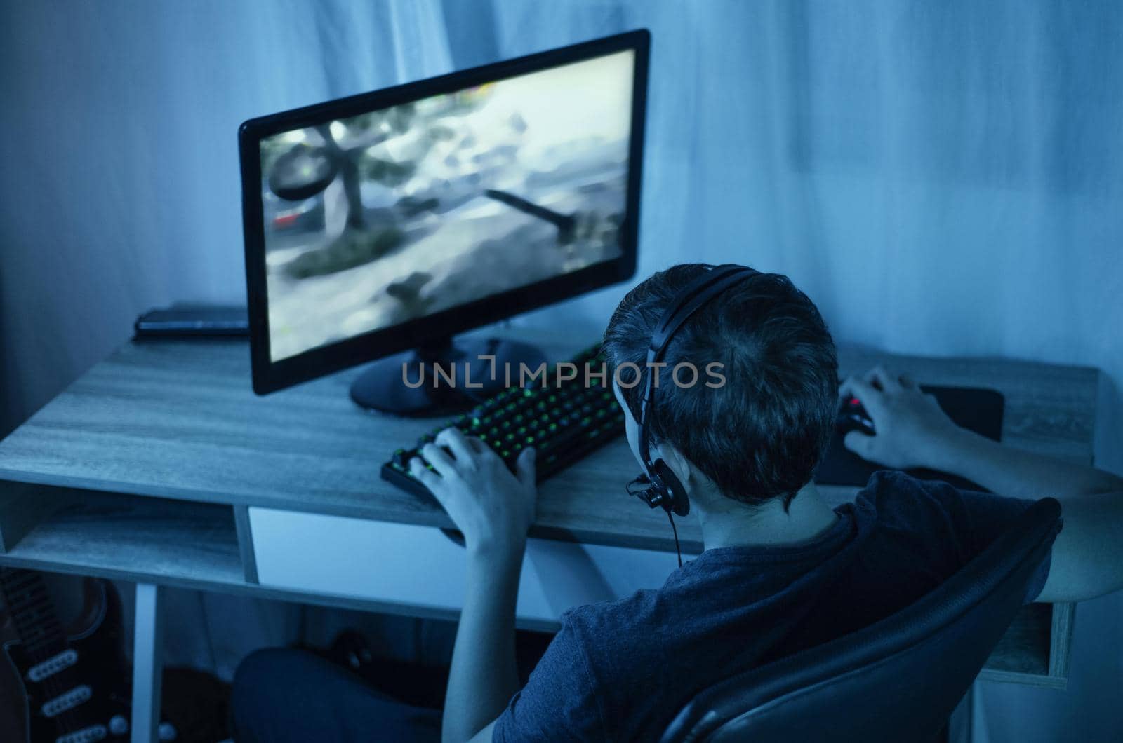 young boy playing computer. High quality beautiful photo concept by Zahard