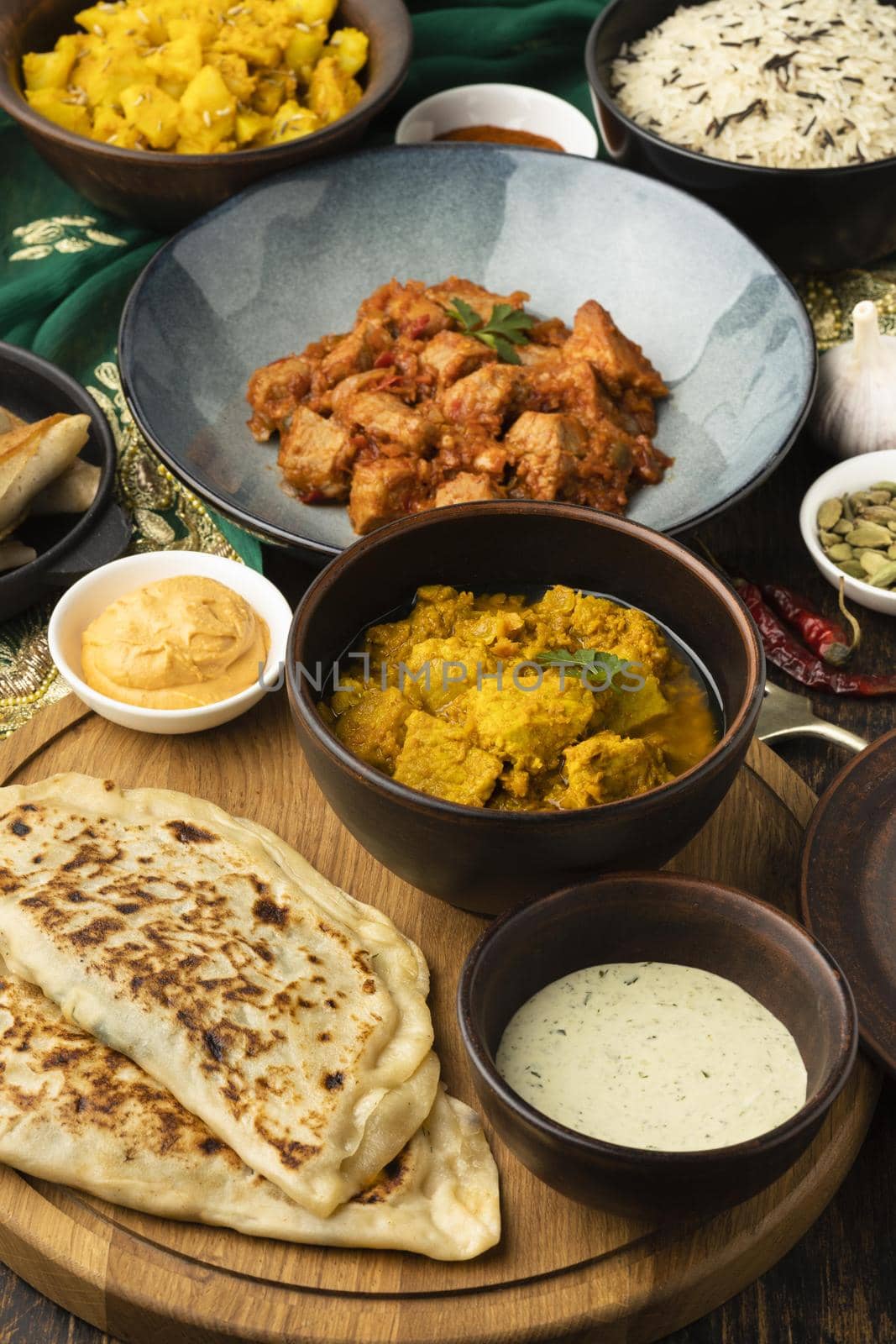 high angle indian food assortment. High quality beautiful photo concept by Zahard