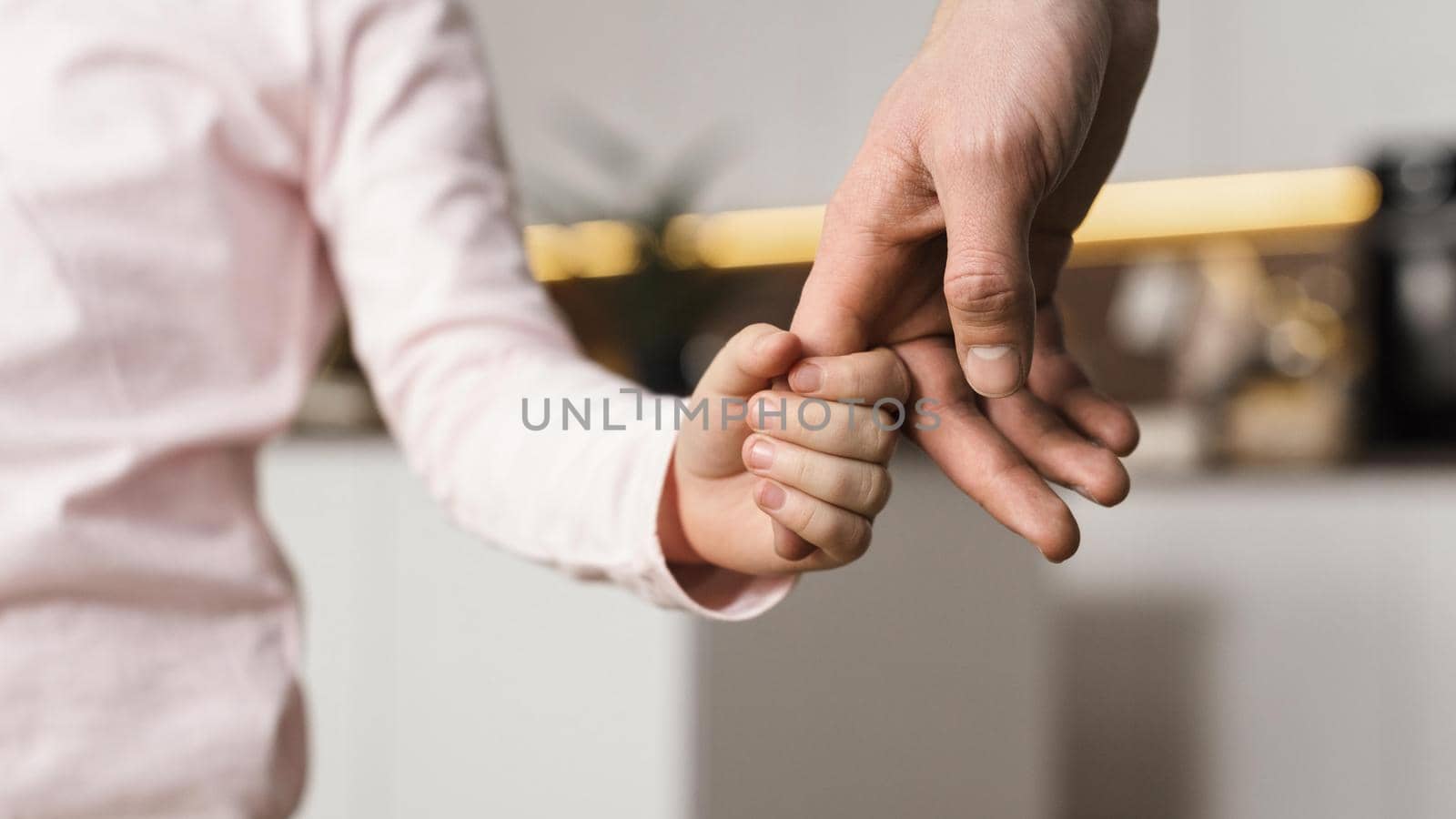 little girl holding hands with father. High quality beautiful photo concept by Zahard