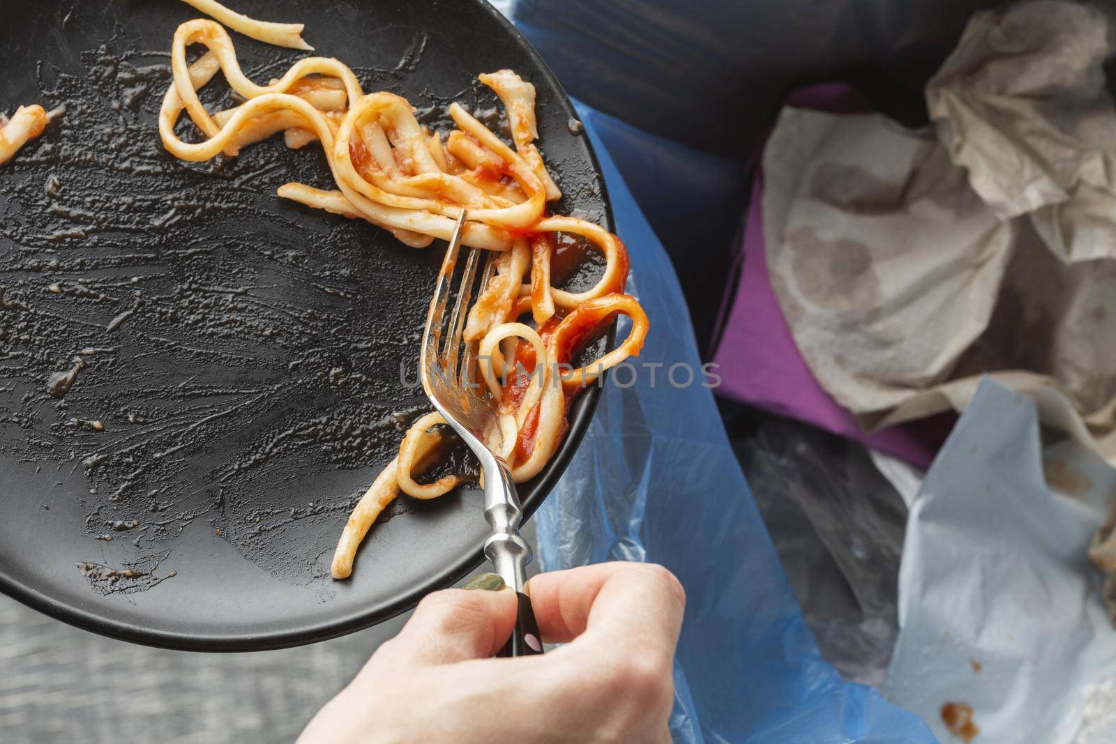leftover wasted spaghetti pasta thrown bin. High quality beautiful photo concept by Zahard