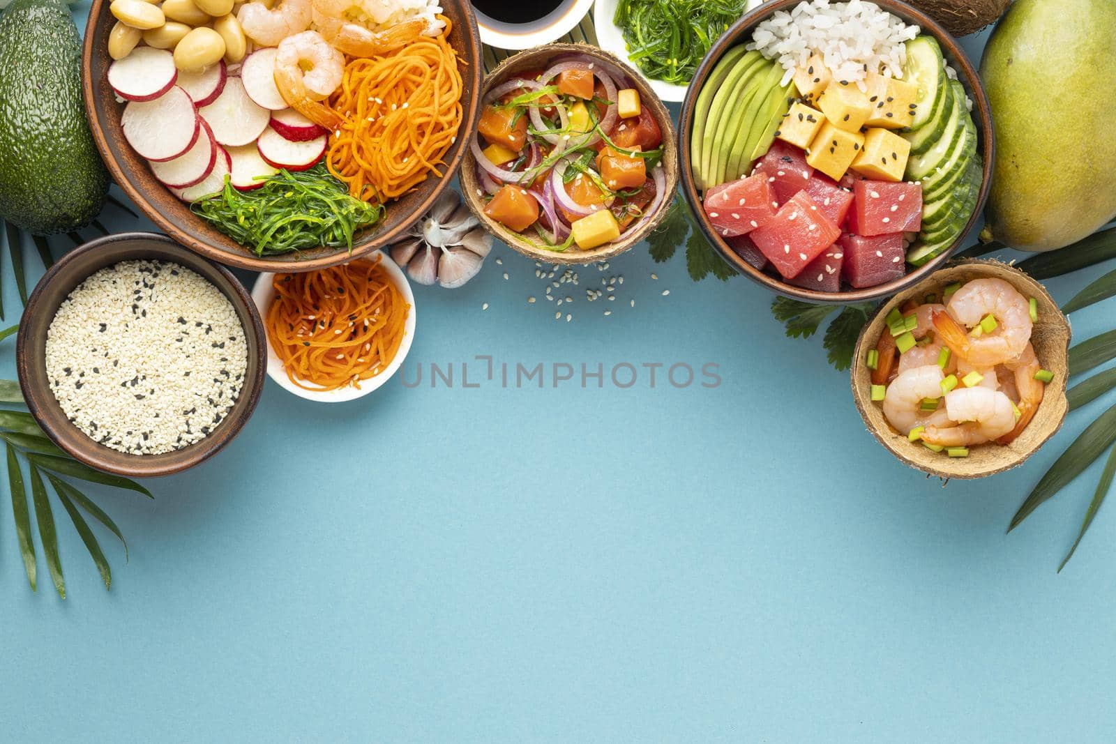 top view assortment delicious poke bowl. High quality beautiful photo concept by Zahard