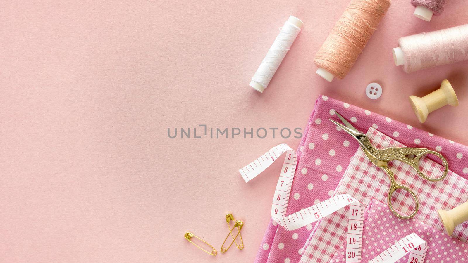 top view sewing essentials with thread buttons. High quality beautiful photo concept by Zahard