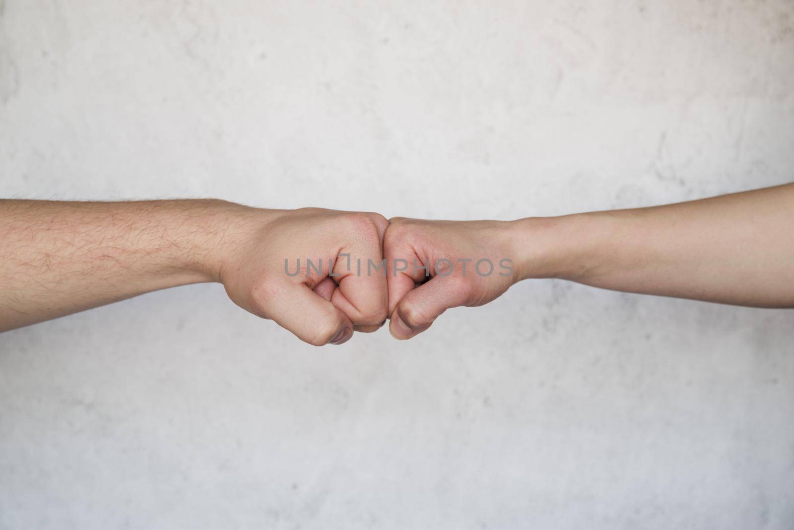 fist bump welcome gesture. High quality beautiful photo concept by Zahard