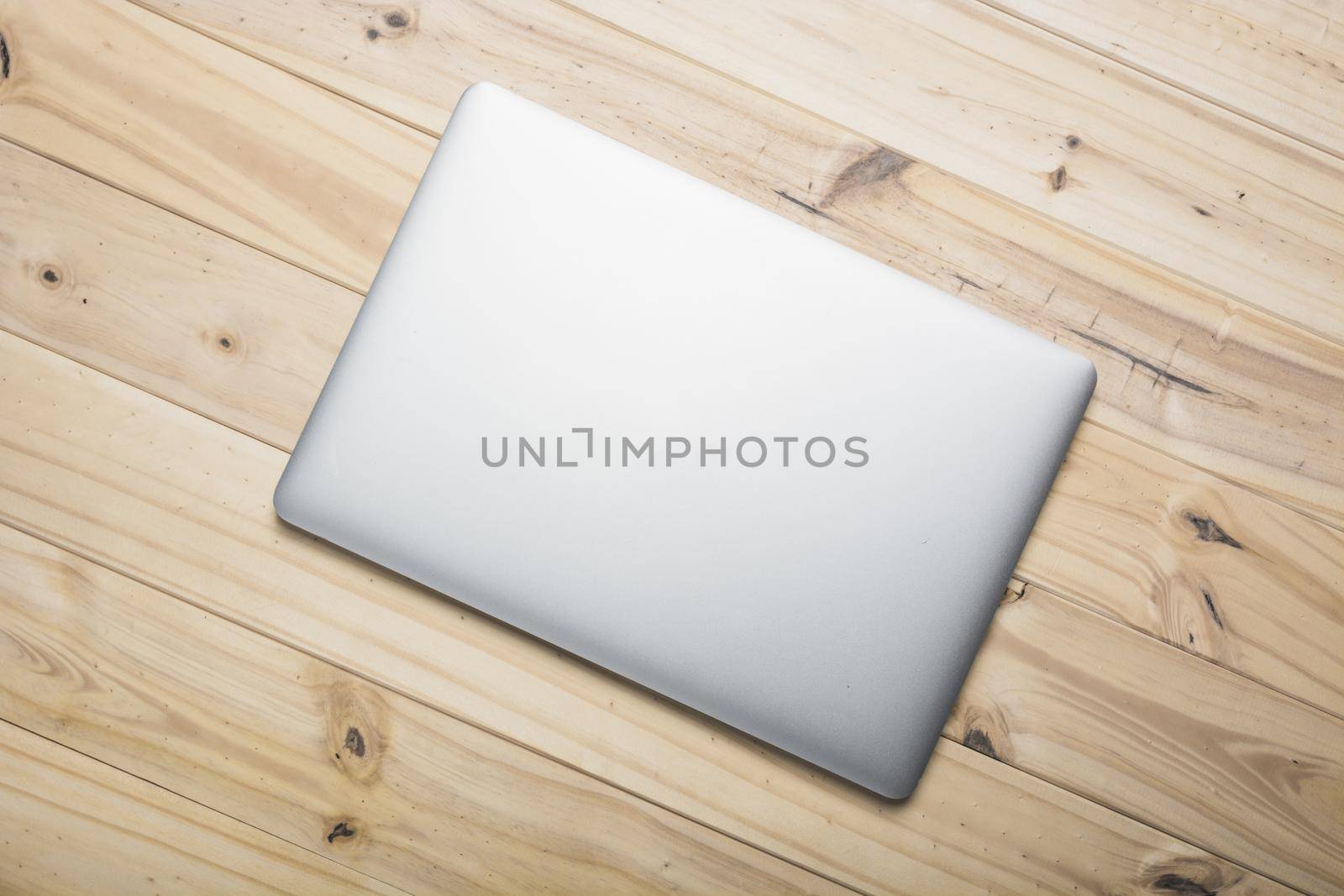 elevated view laptop wooden plank. High quality beautiful photo concept by Zahard