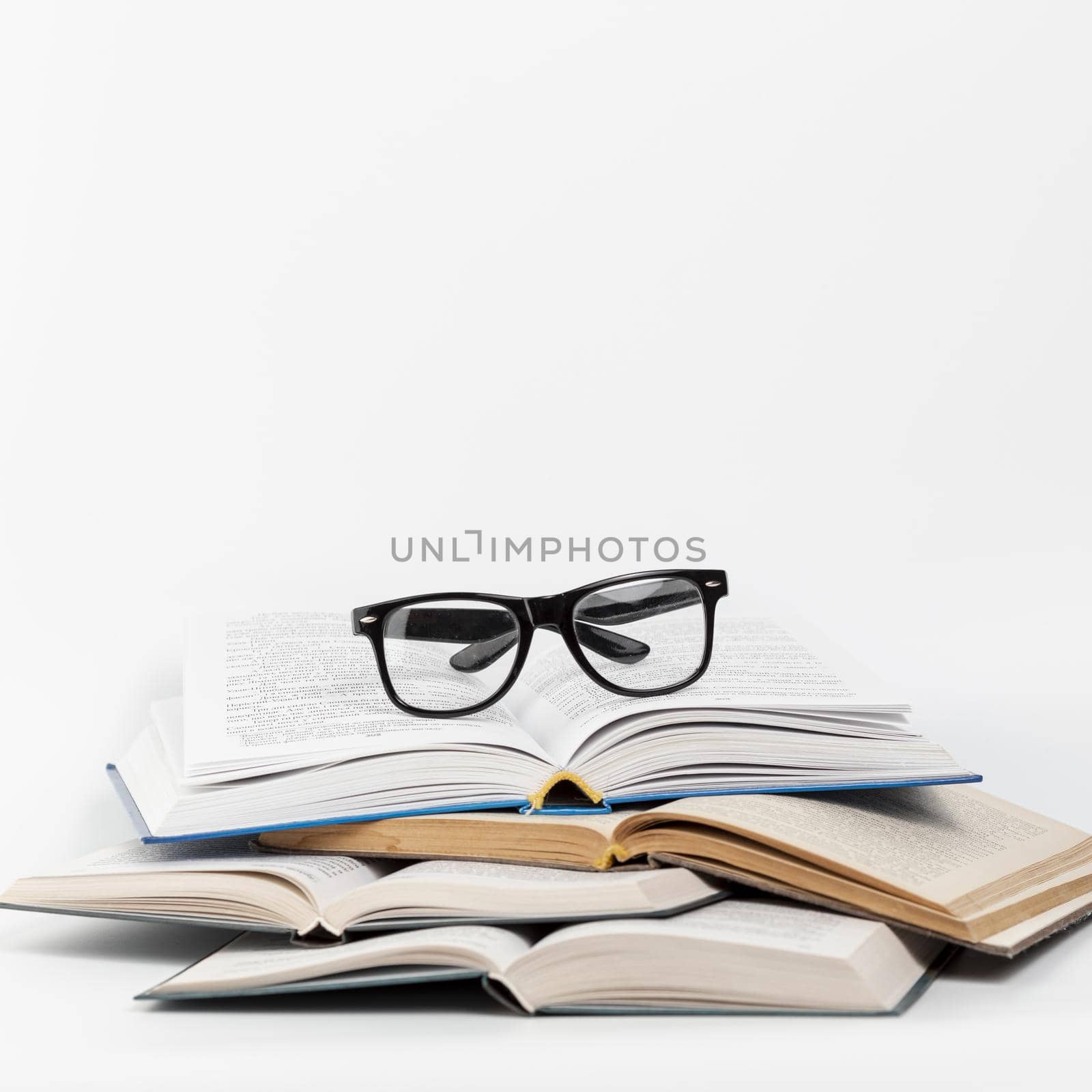 front view open books with glasses. Resolution and high quality beautiful photo