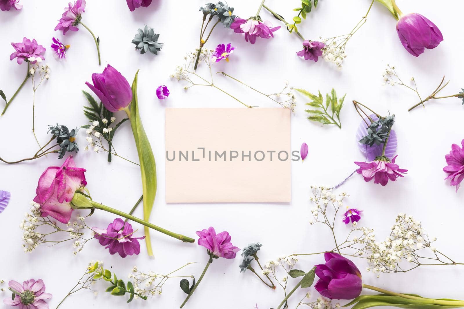 different flowers with paper white table. High quality beautiful photo concept by Zahard
