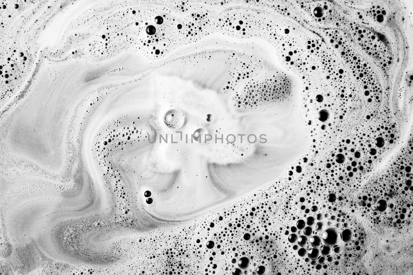 dissolving bath bomb tub water with foam. High quality beautiful photo concept by Zahard