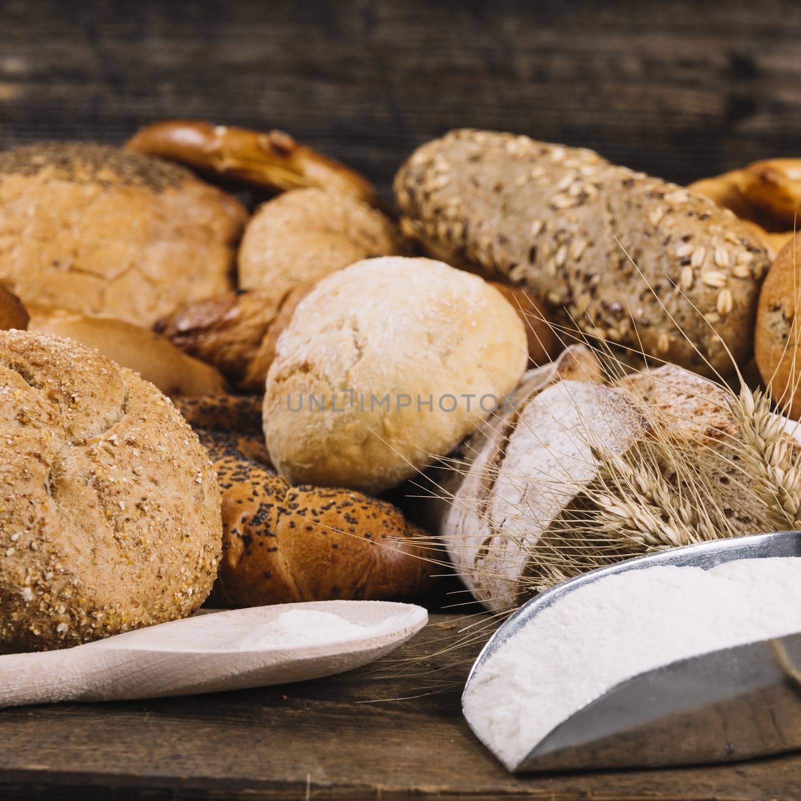 flour with baked whole grain breads table. High quality beautiful photo concept by Zahard