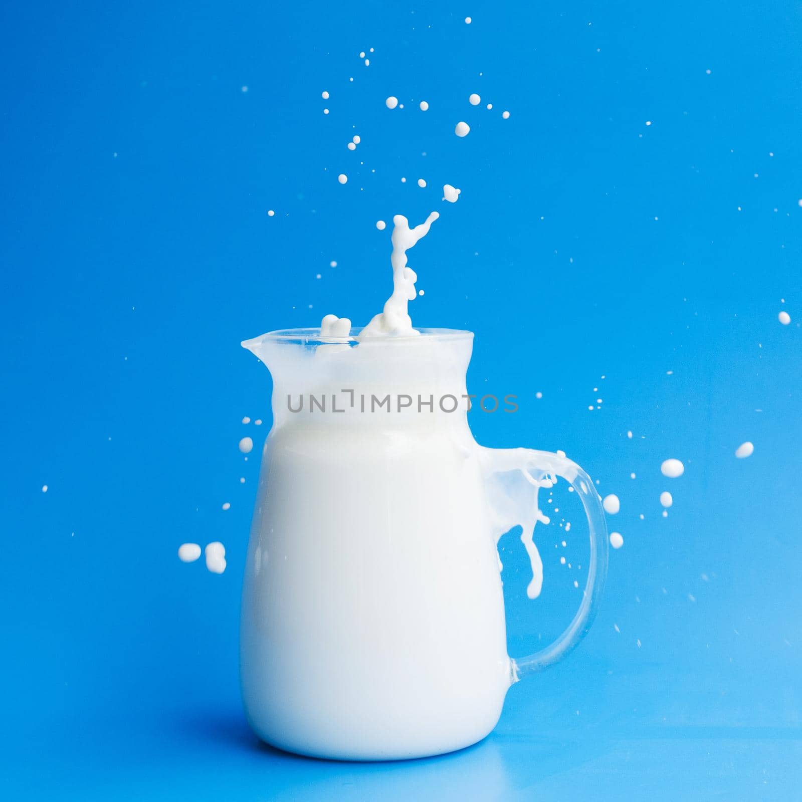 glass jar full milk. High quality beautiful photo concept by Zahard