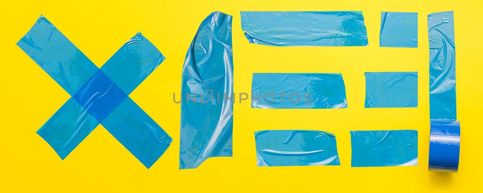 Photo Blue tape on yellow background. Resolution and high quality beautiful photo
