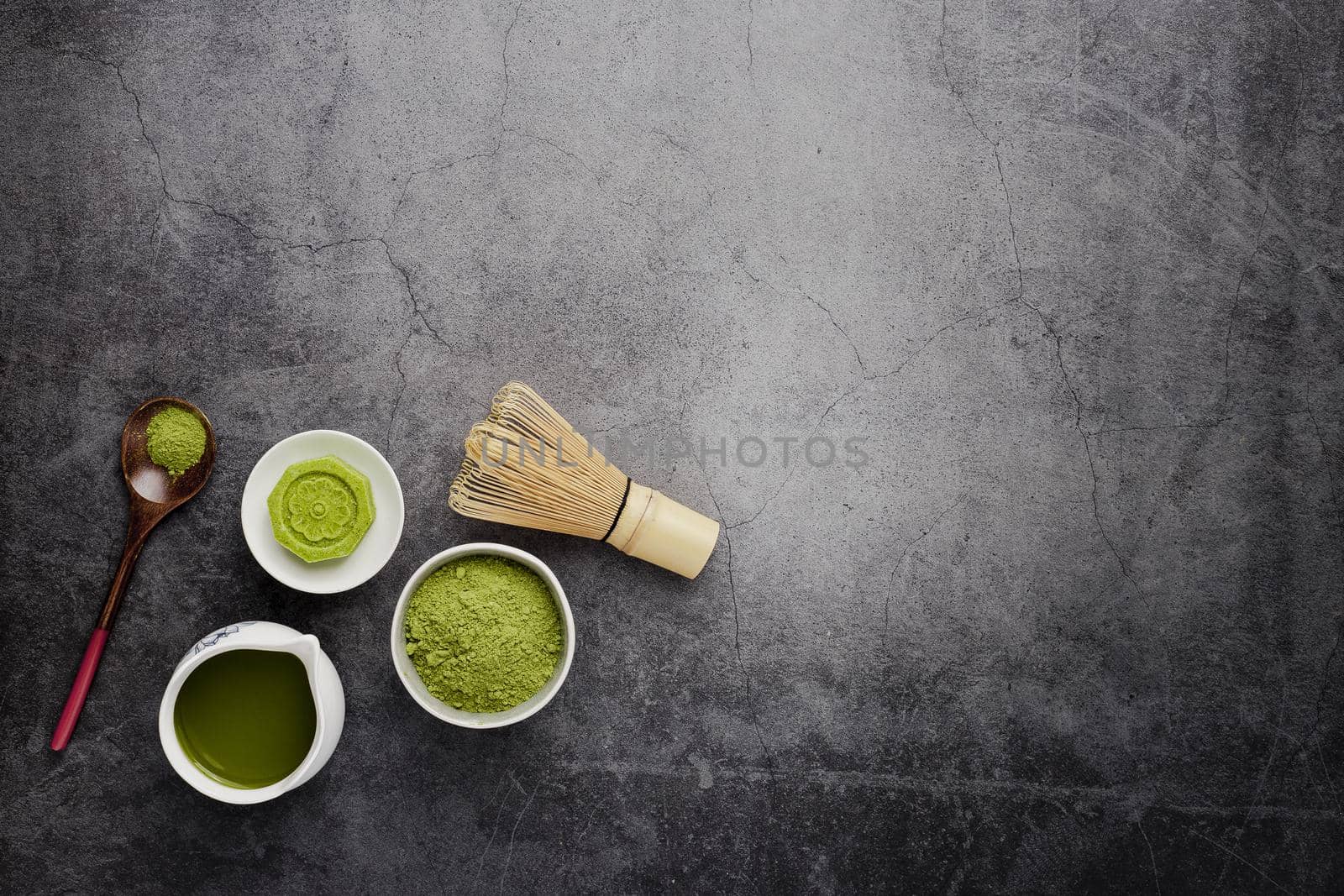 flat lay matcha tea power with wooden spoon. High quality beautiful photo concept by Zahard