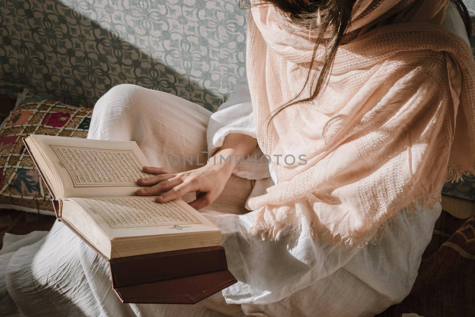 sitting woman reading quran. High quality beautiful photo concept by Zahard