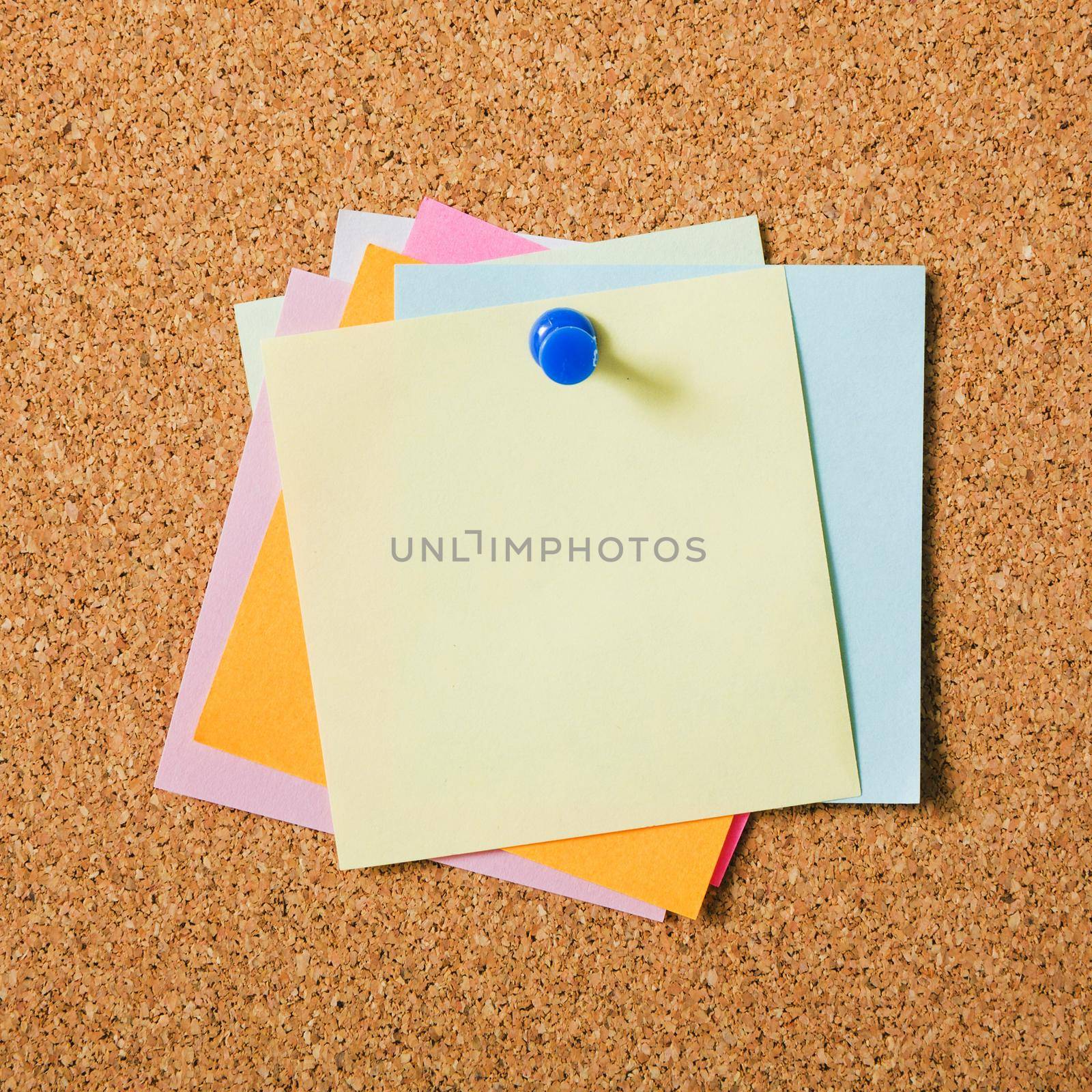 various colors sticky post notes with pushpin cork board. High quality beautiful photo concept by Zahard