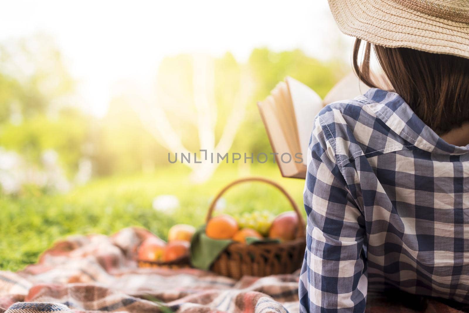 woman relaxing reading book park. Resolution and high quality beautiful photo