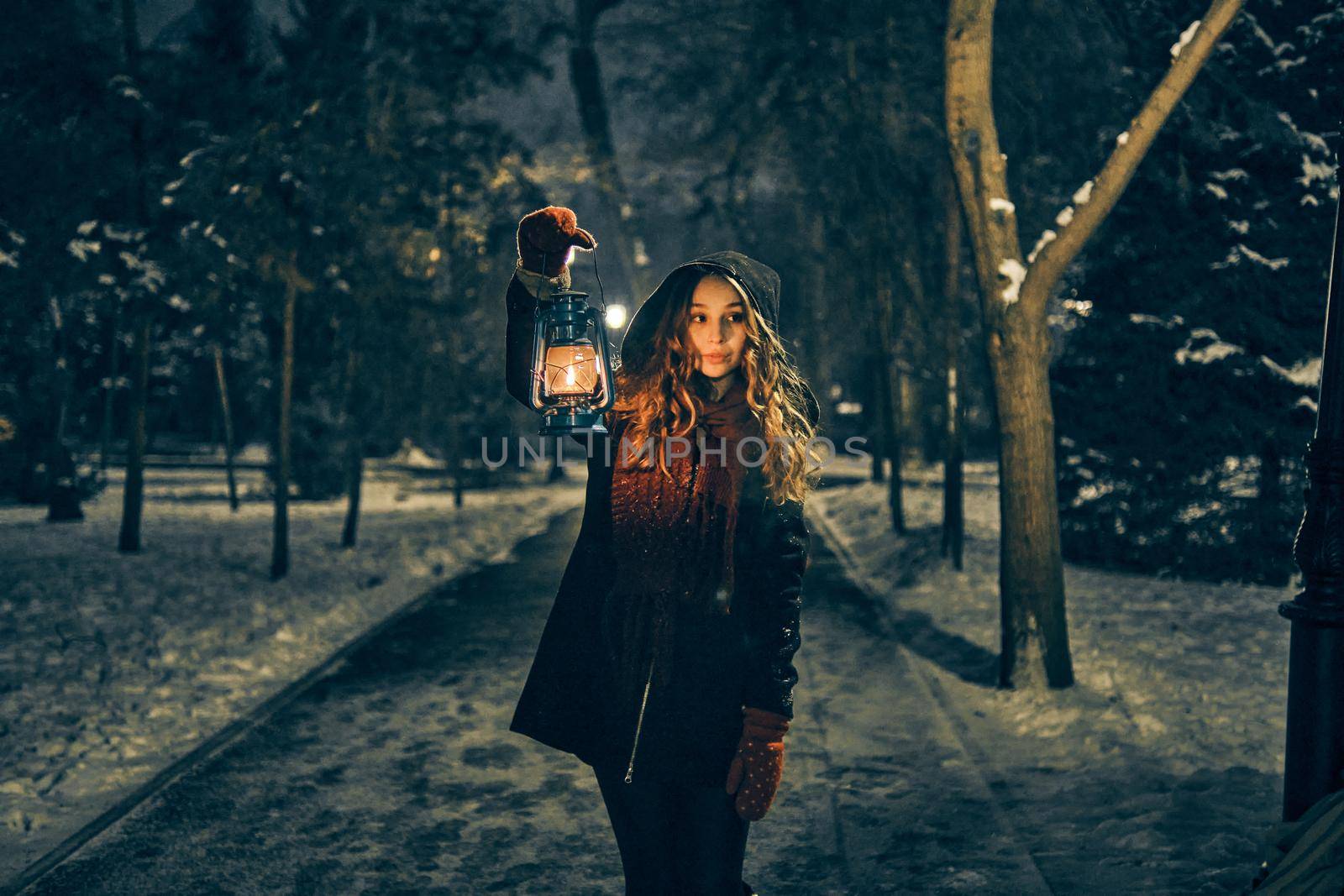 Young girl in winter forest fairy tale by snep_photo