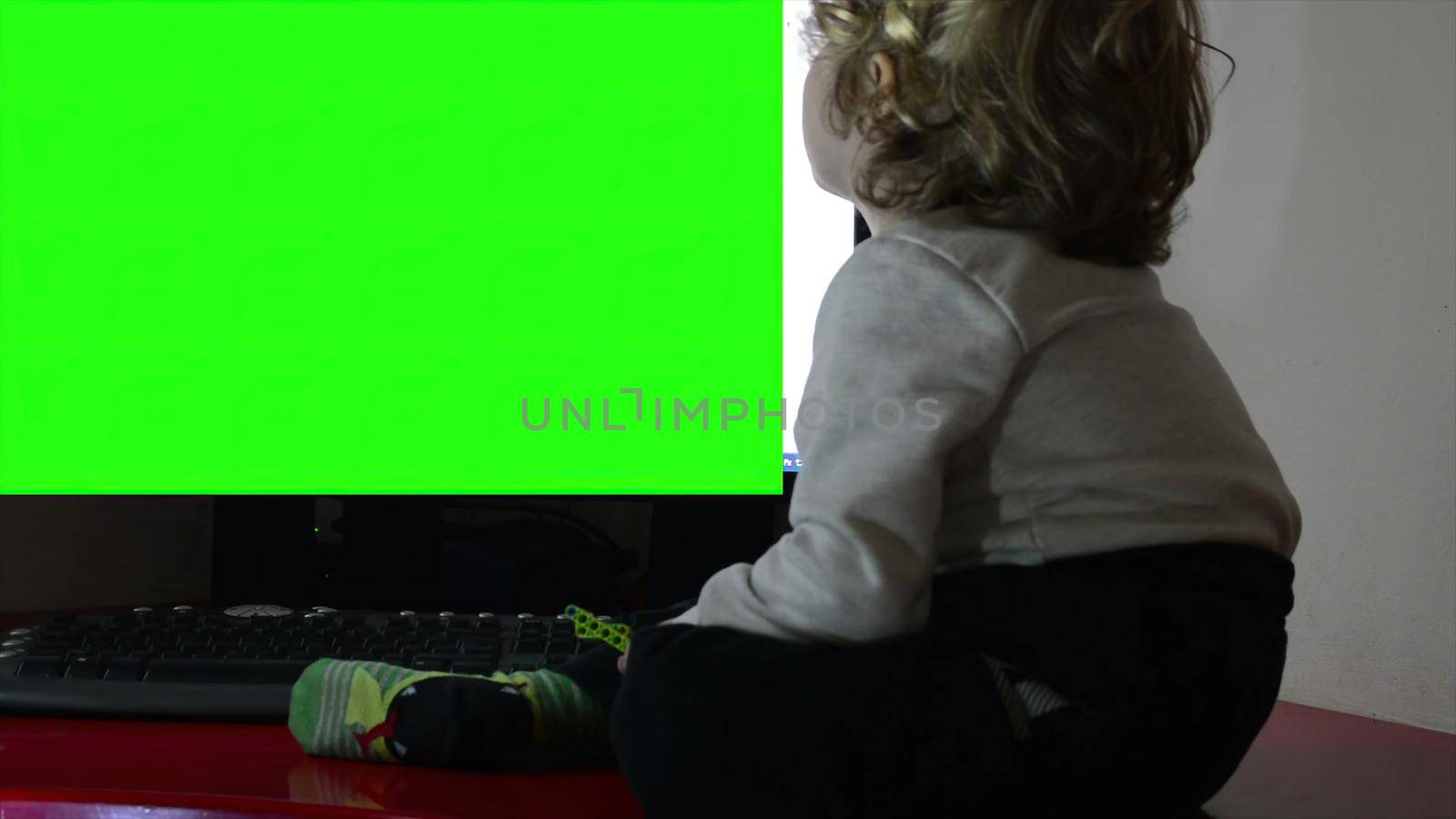 
3d illustration - Little boy watching TV,green screen