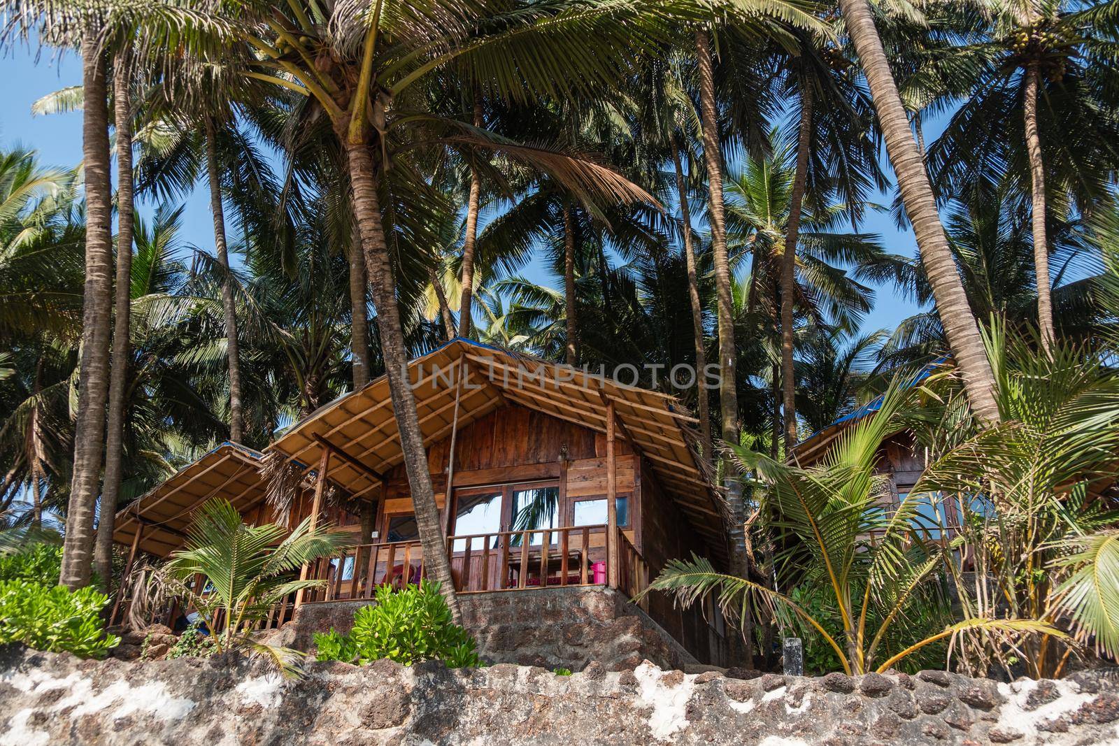 Wooden bungalows on Colva Beach, South Goa, India