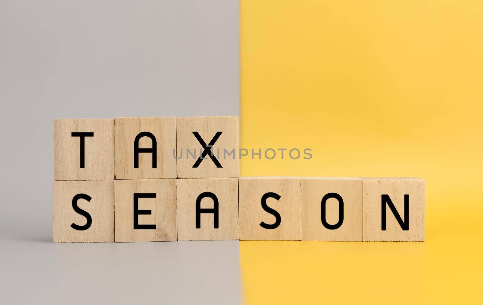 Tax season text on wooden cubes for business