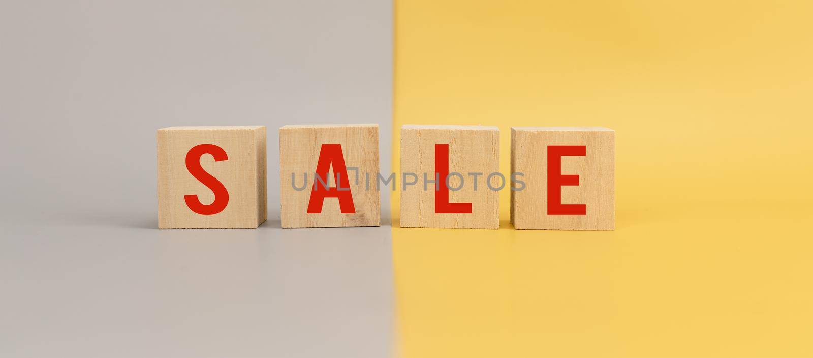 Wooden cubes with text SALE for banner advertising by Buttus_casso