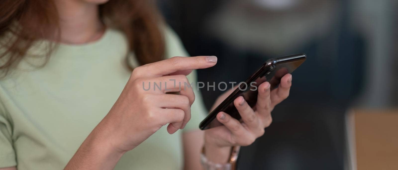 point finger on screen mobile phone closeup, person texting text message girls using in hands cellphone close up, online internet