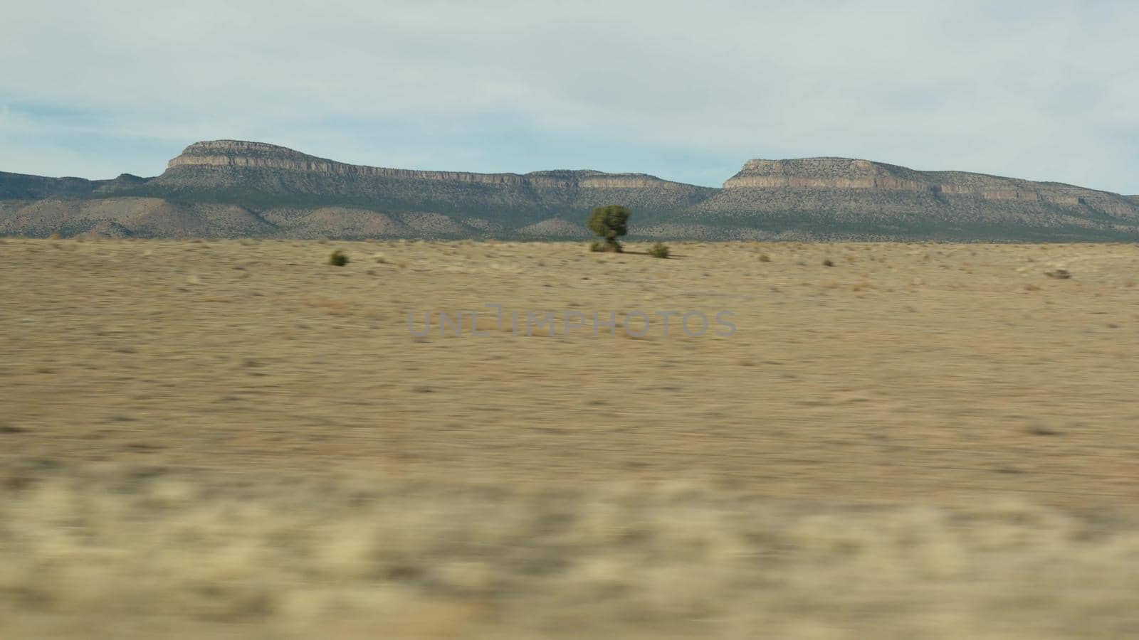 Road trip from Grand Canyon, Arizona USA. Driving auto, route to Las Vegas, Nevada. Hitchhiking traveling in America, local journey, wild west calm atmosphere, indian lands. Wilderness thru car window