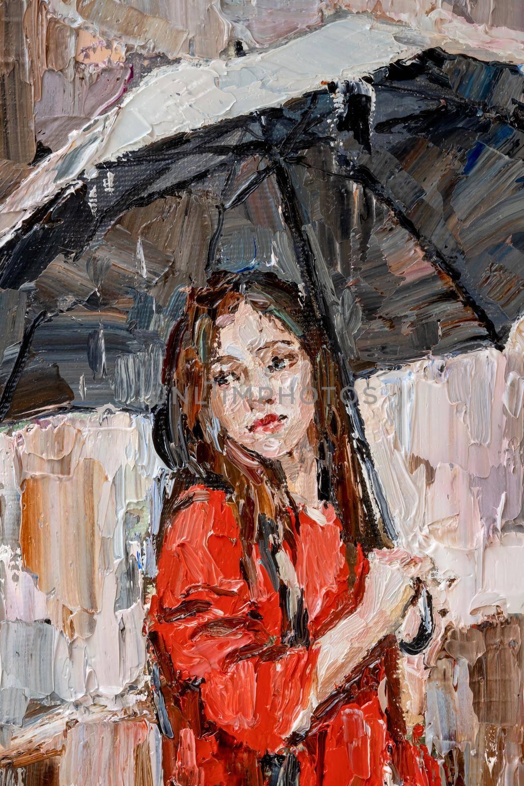 .Girl in the rain with an umbrella in her hands. by africapink