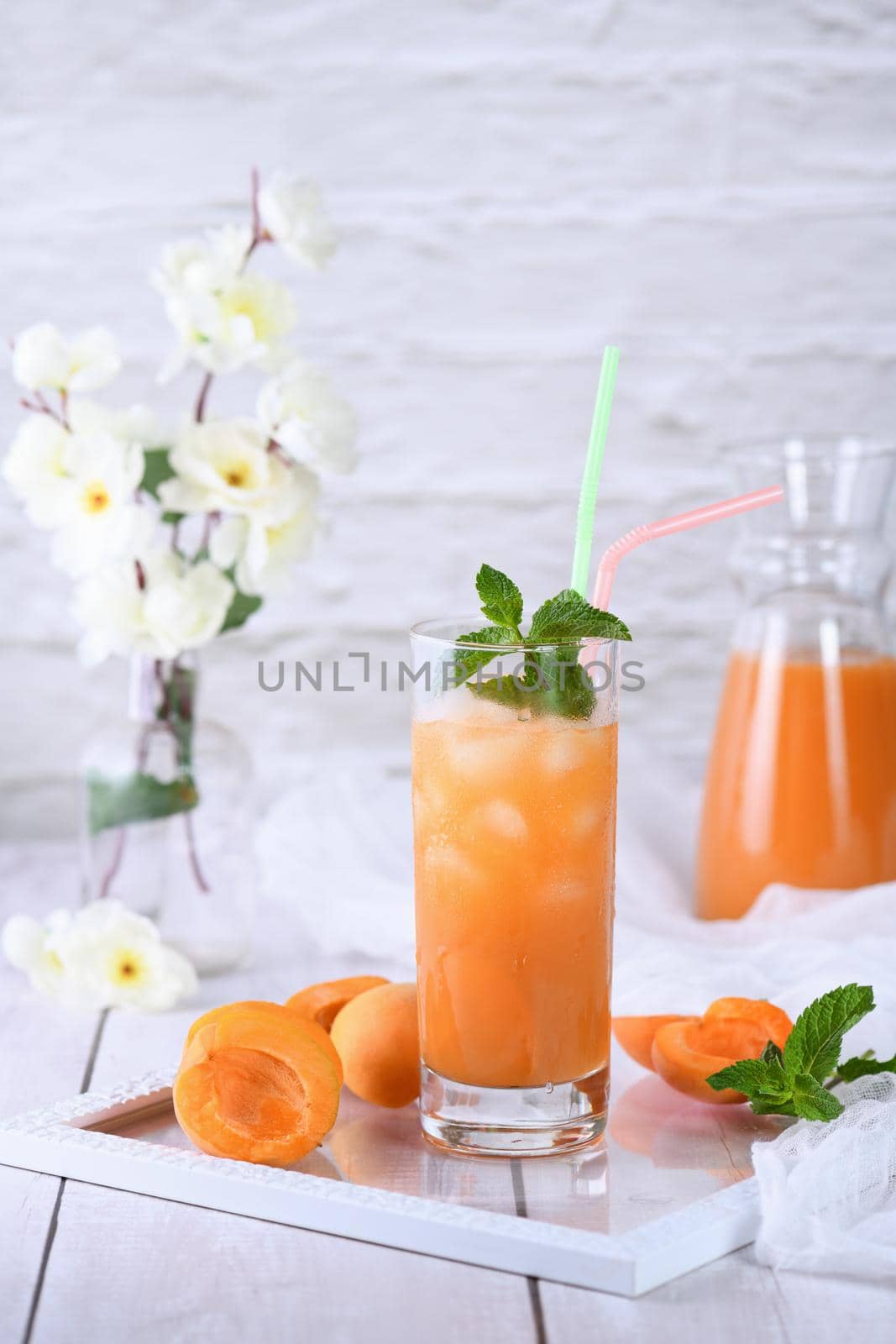 Refreshing, freshly cooked non-alcoholic cocktail made from apricot juice and mint 