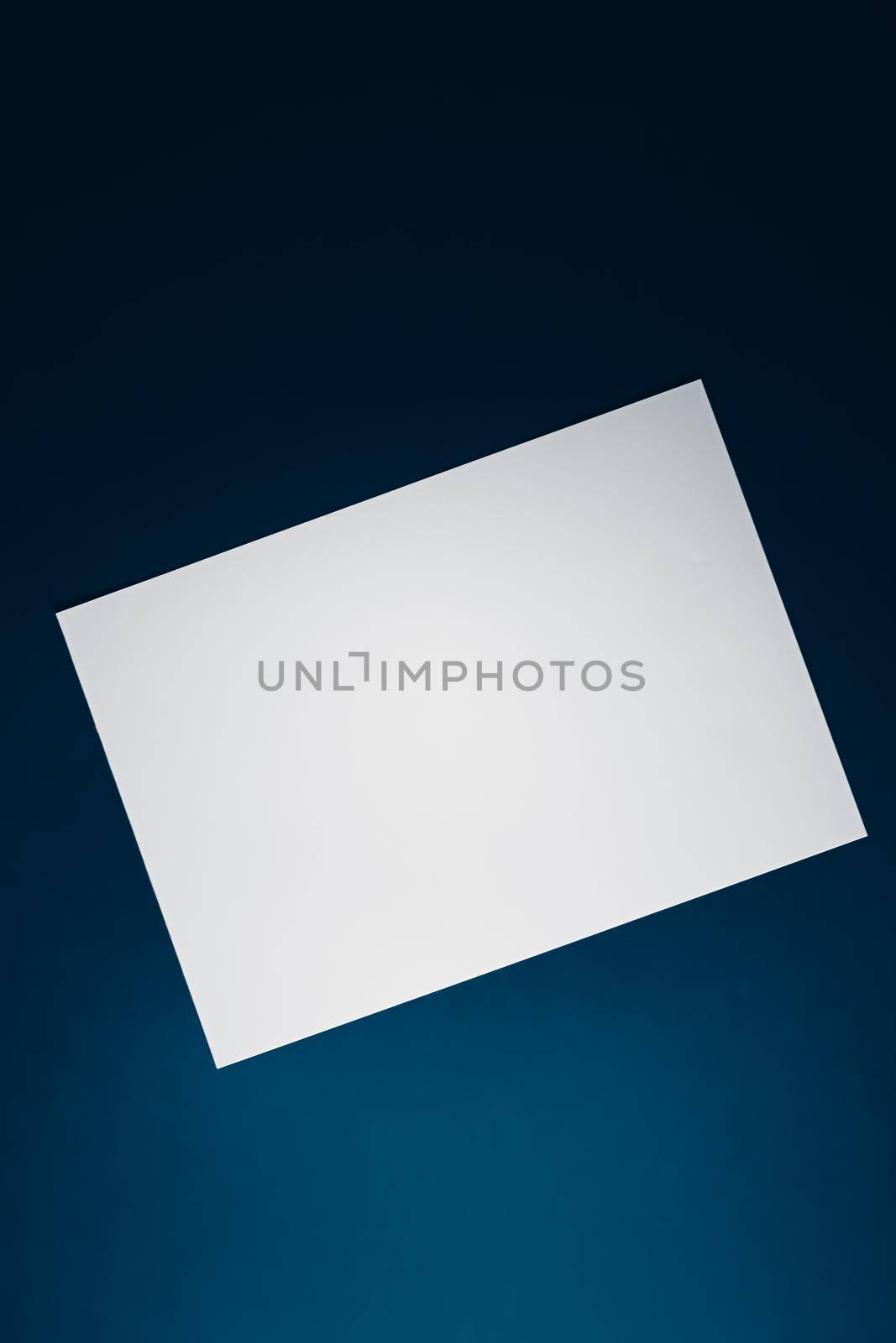 Blank A4 paper, white on blue background as office stationery flatlay, luxury branding flat lay and brand identity design for mockup.