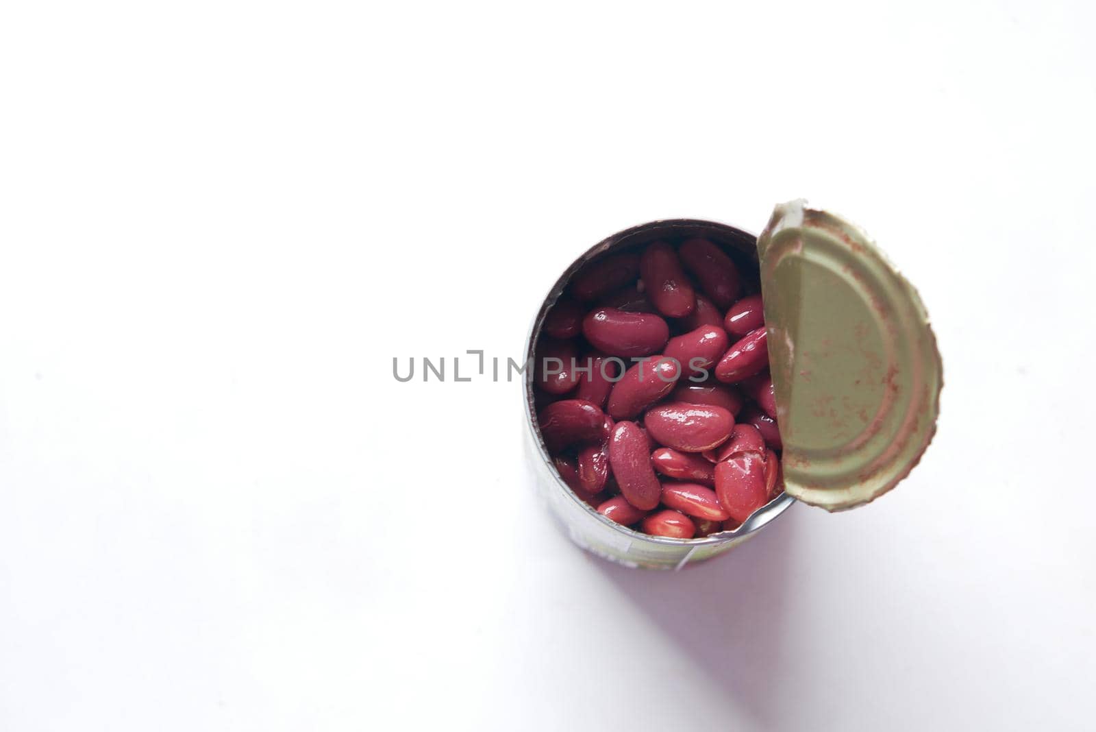 Grains Red bean in a tin container on table . by towfiq007