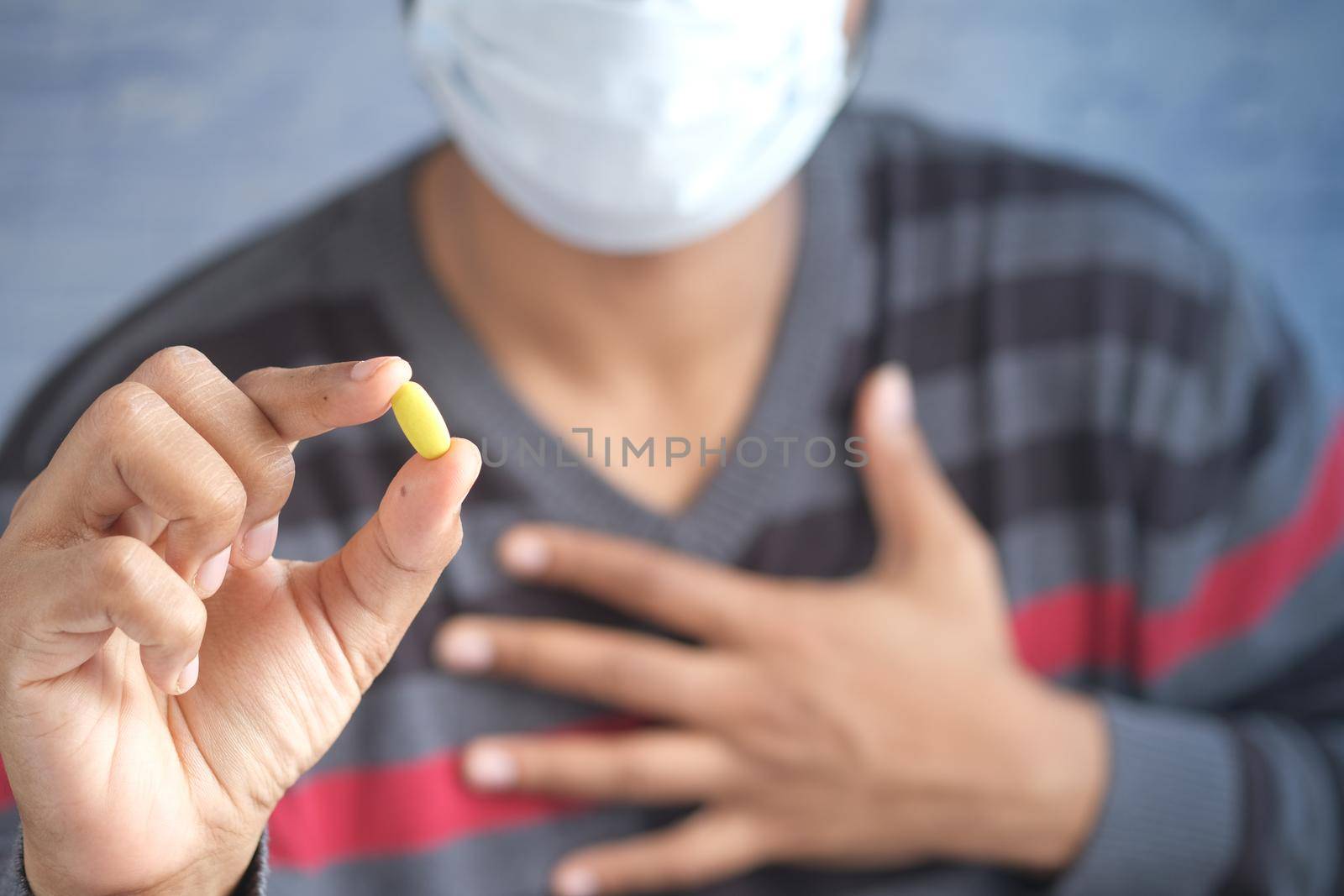 Portrait of sick man sneezes and coughs,