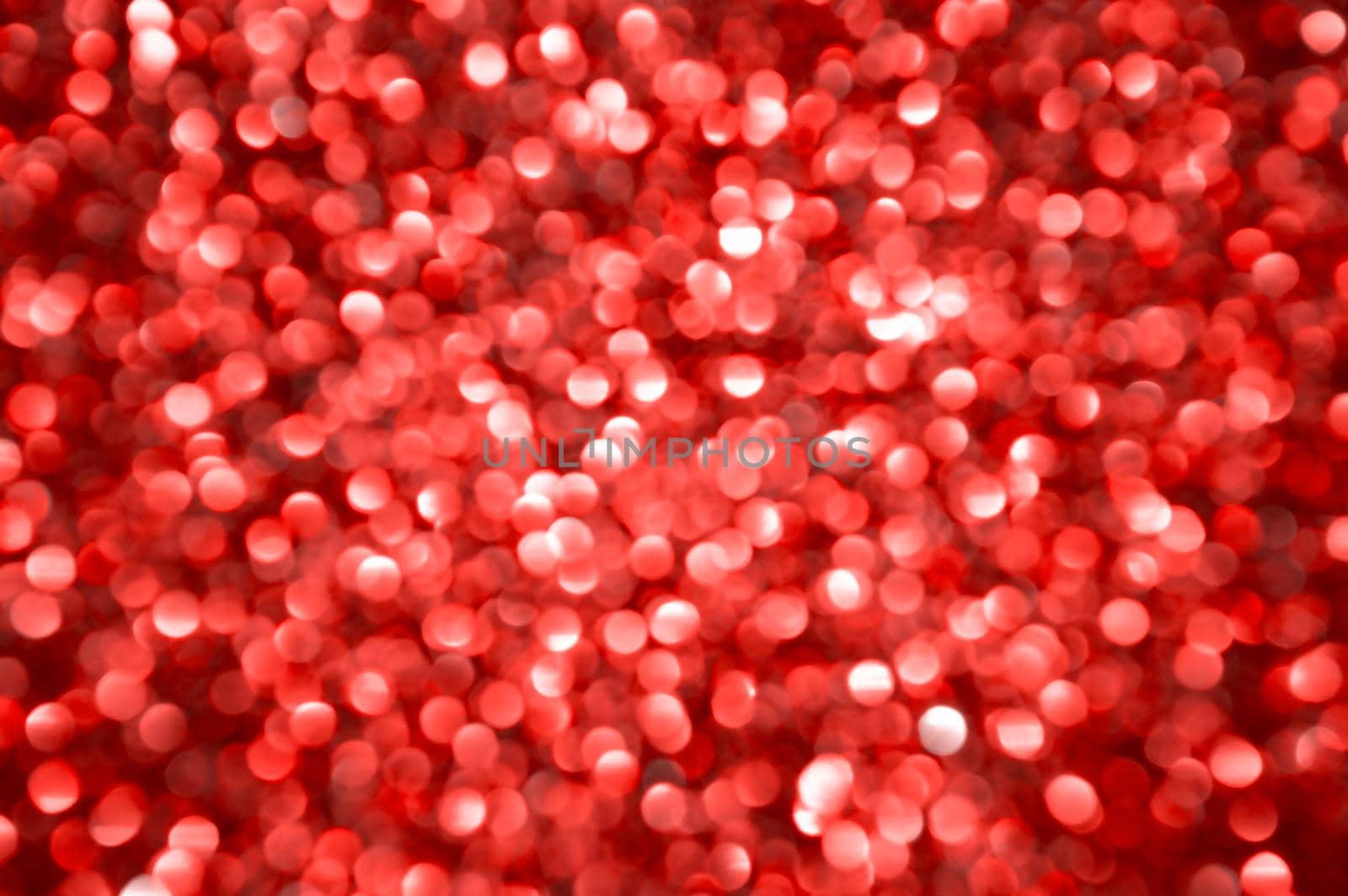 Red defocused lights background. Abstract festive backdrop