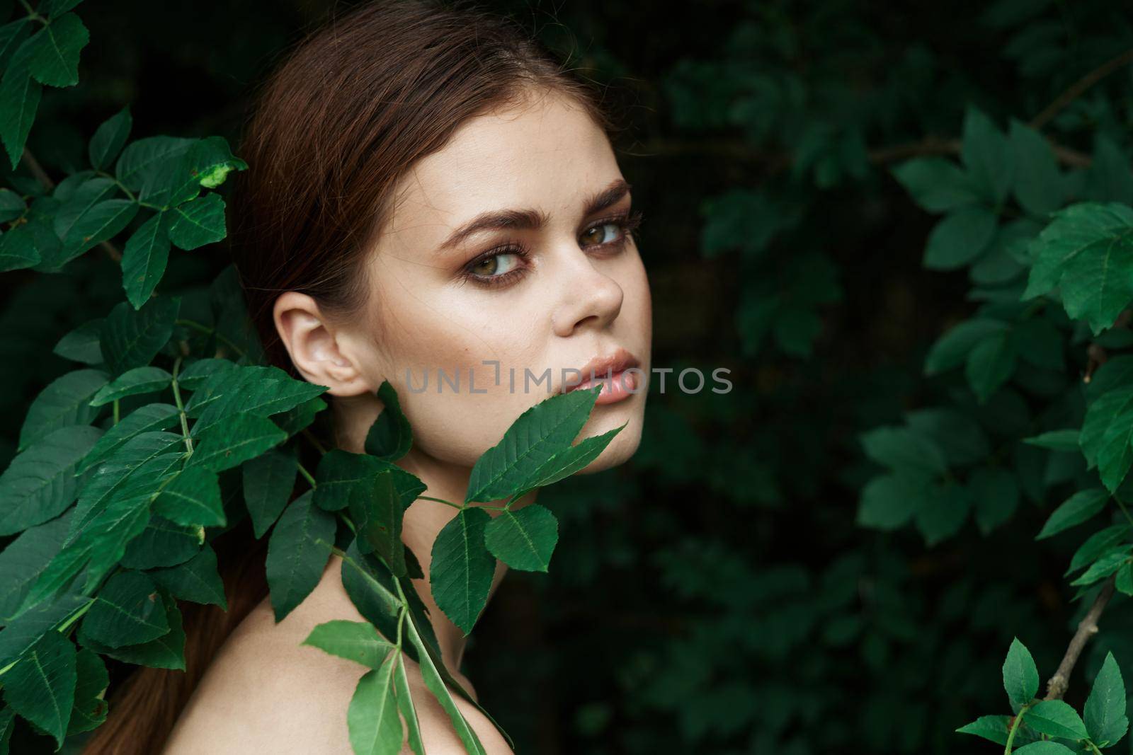 portrait of a woman skin care bare shoulders green leaves nature Lifestyle by Vichizh