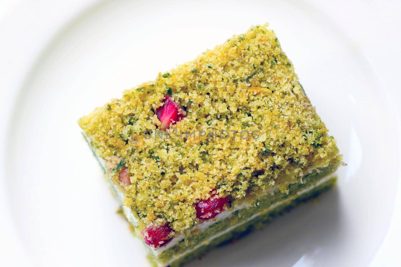 Top view of a white plate with dessert for tea