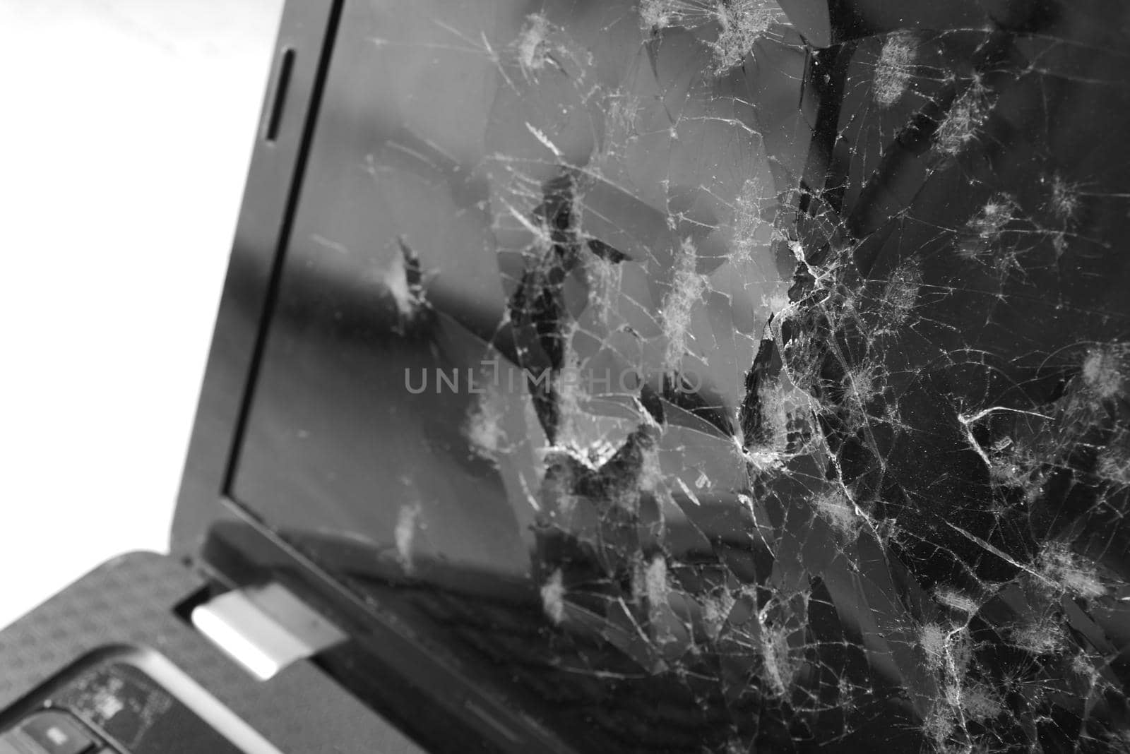 broken laptop screen on table close up by towfiq007