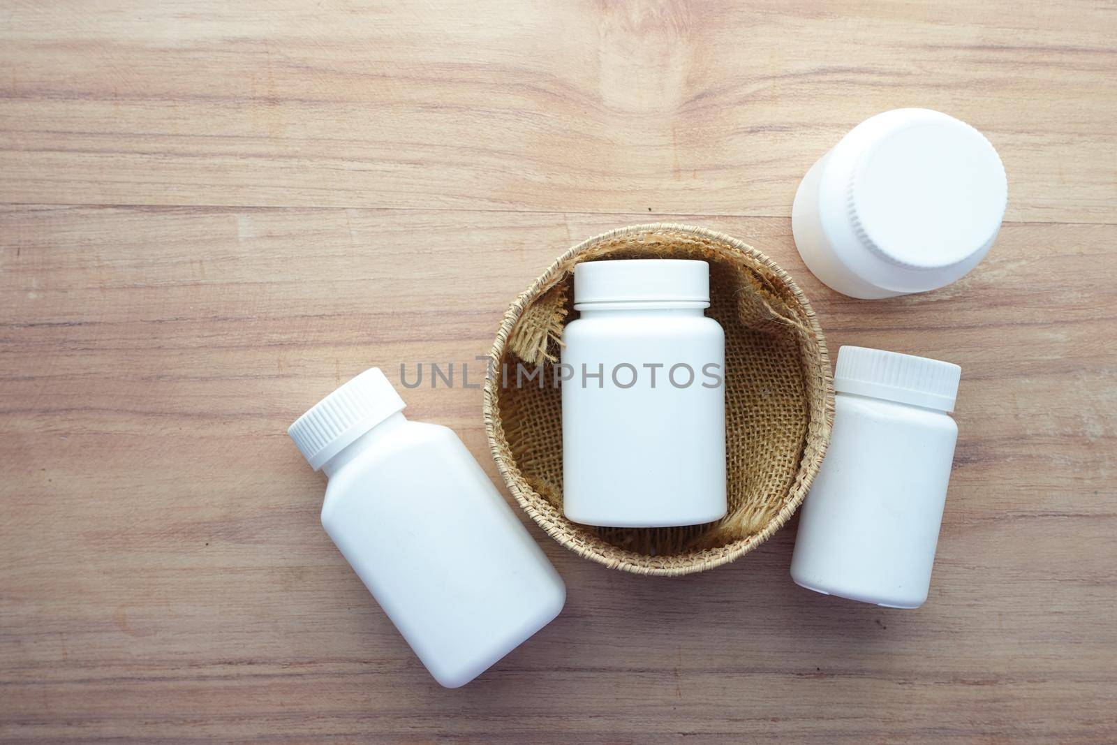 many medical pills container on table ,