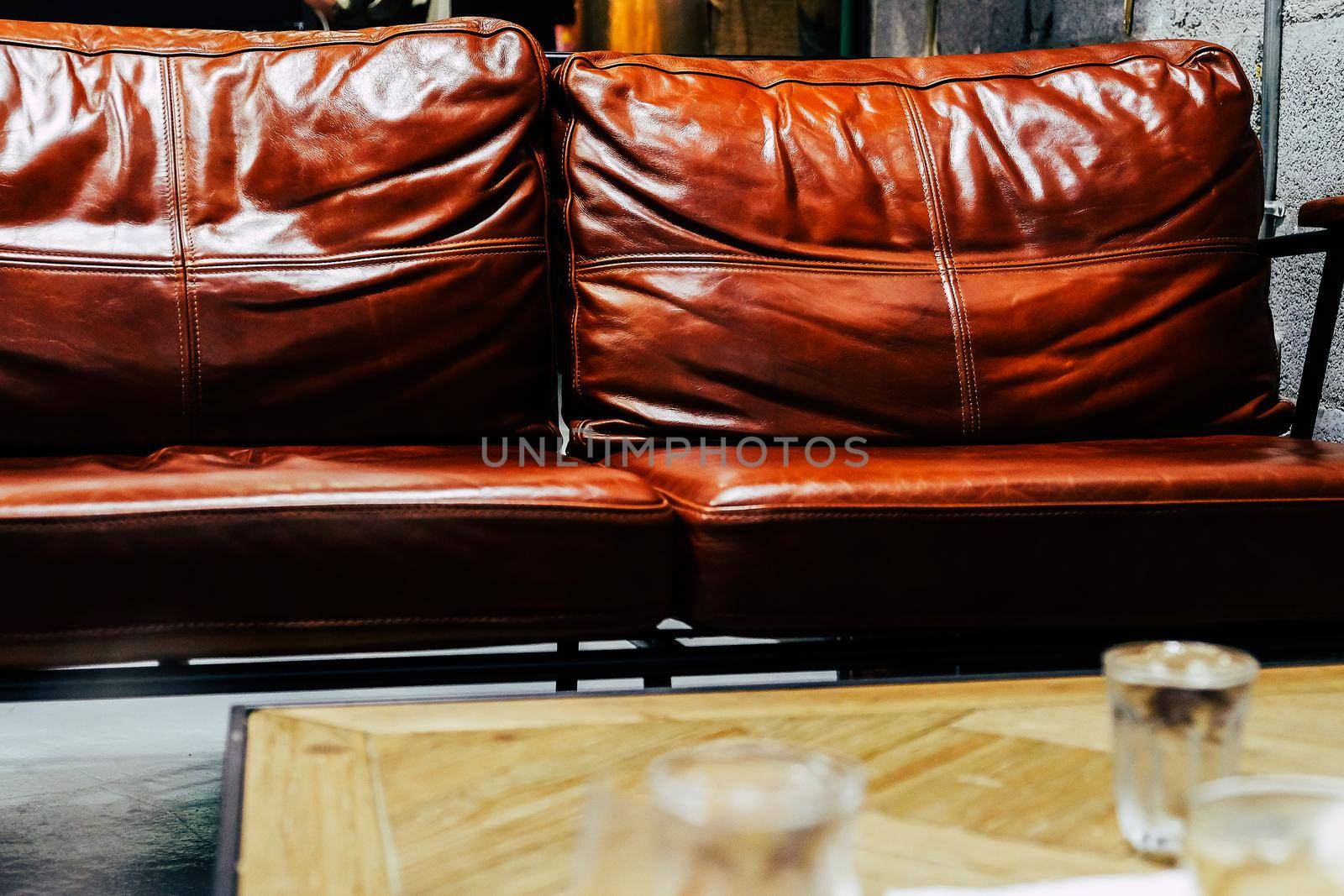 Close up detail of leather sofa. interior decor