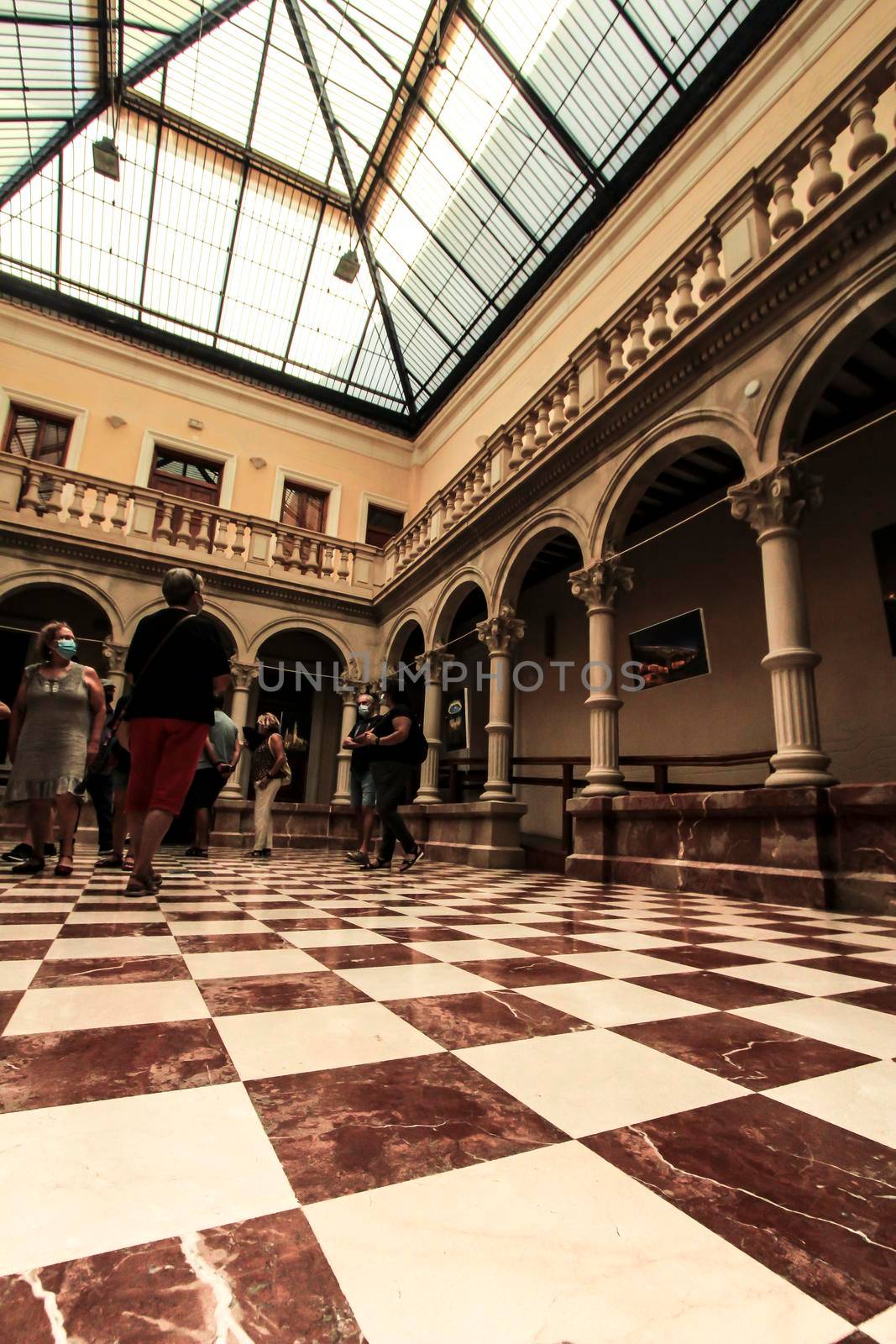 Novelda, Alicante, Spain- September 18, 2021: Beautiful courtyard with skylight and marble columns of the Gomez-Tortosa Center Modernist house in Novelda