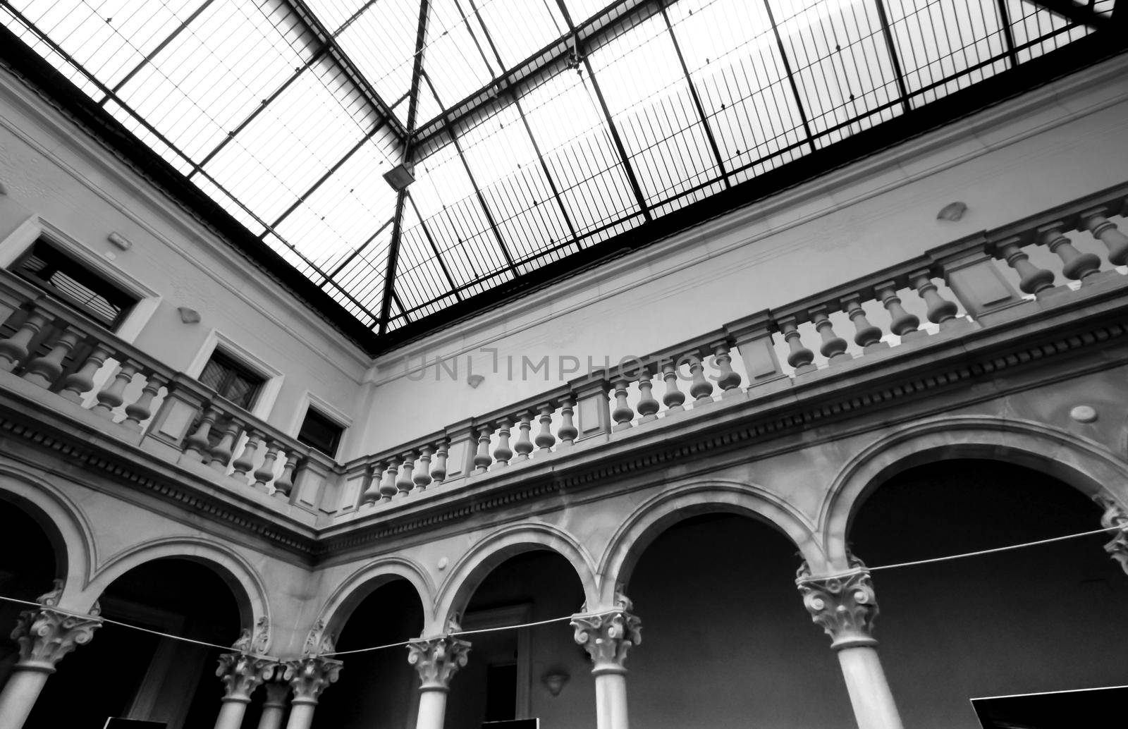 Novelda, Alicante, Spain- September 18, 2021: Beautiful courtyard with skylight and marble columns of the Gomez-Tortosa Center Modernist house in Novelda