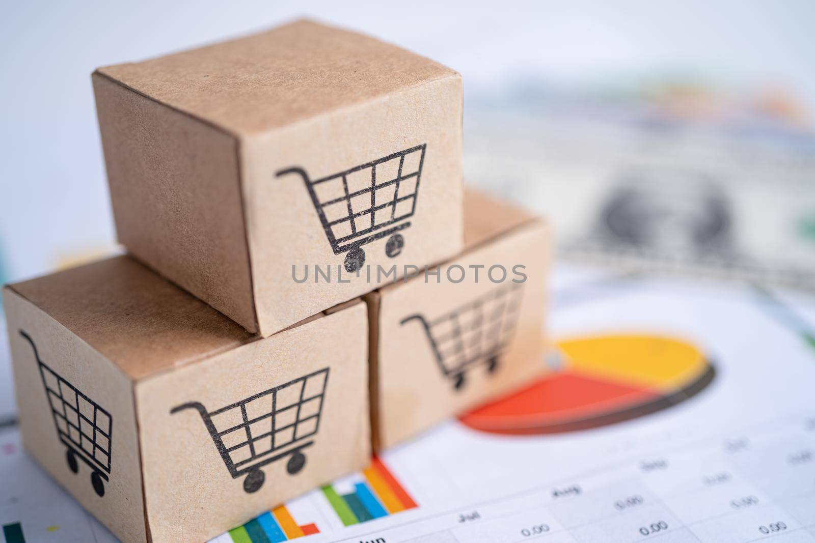 Shopping cart logo on box with US dollar banknotes, Banking Account, Investment Analytic research data economy, trading, Business import export online company concept.