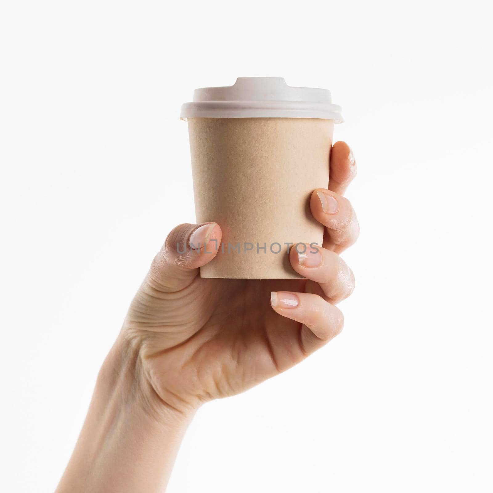 hand holding coffee cup by Zahard