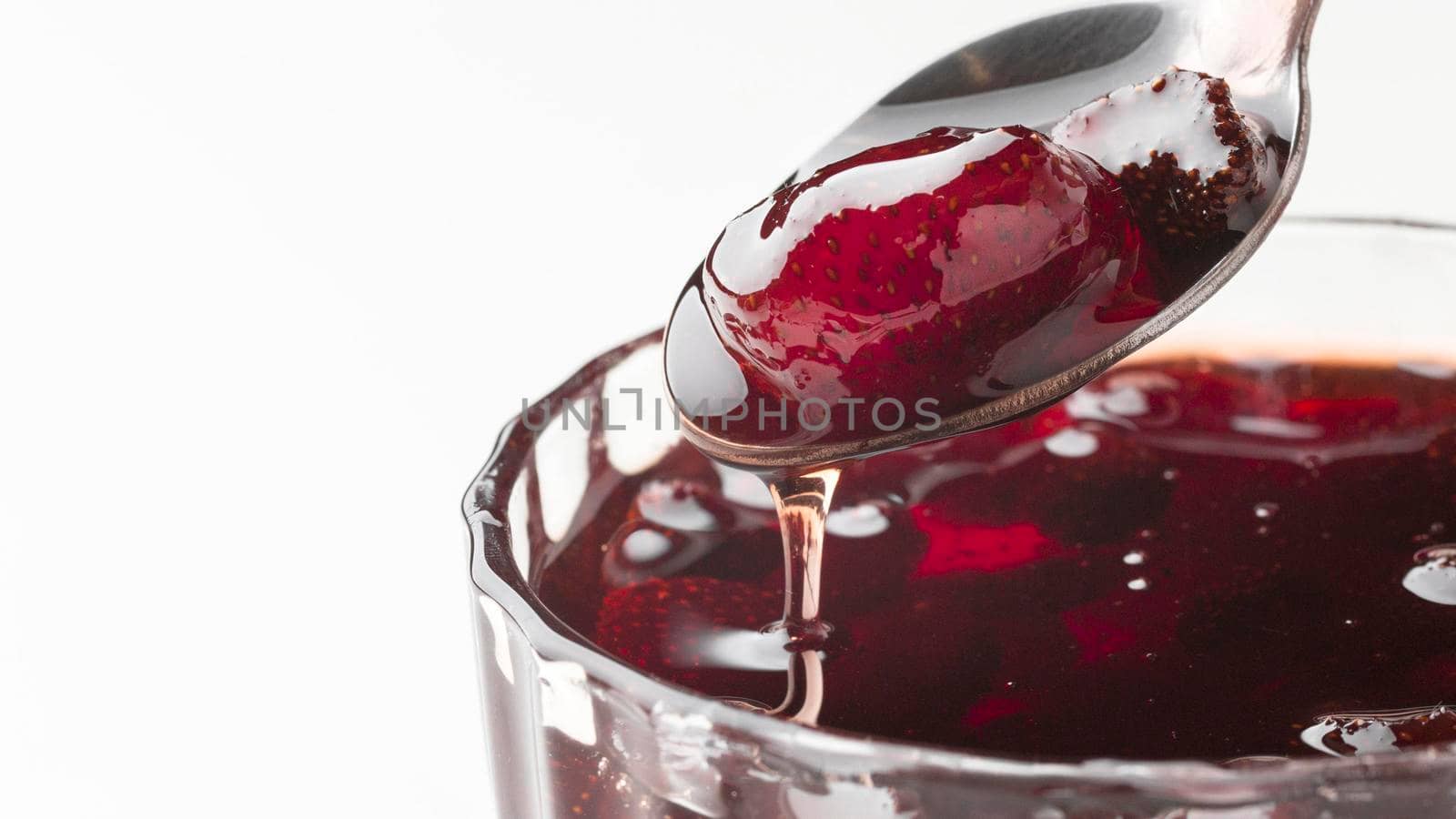 strawberry jam glass. Beautiful photo