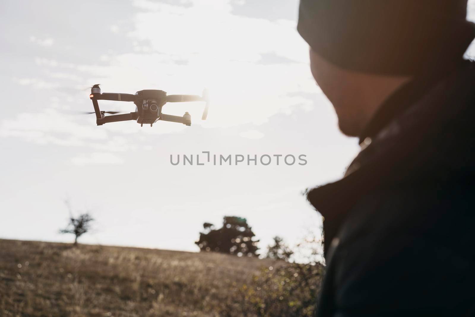 close up man watching drone. Beautiful photo