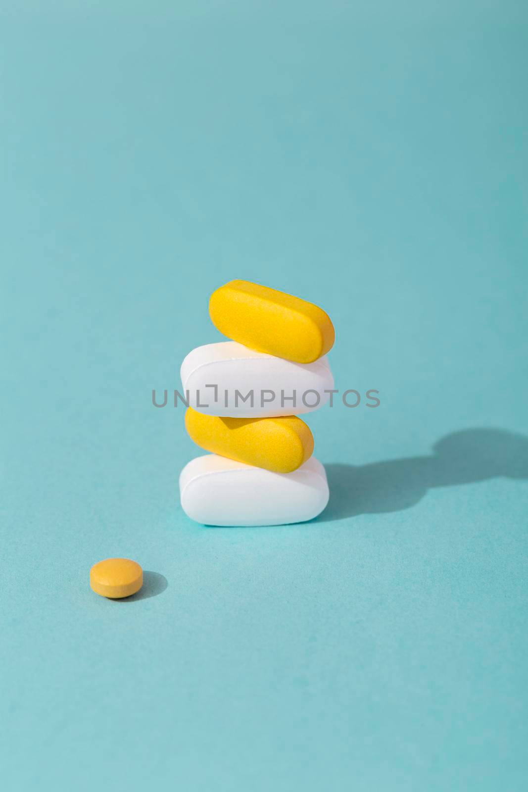 high angle stacked colored pills. Beautiful photo