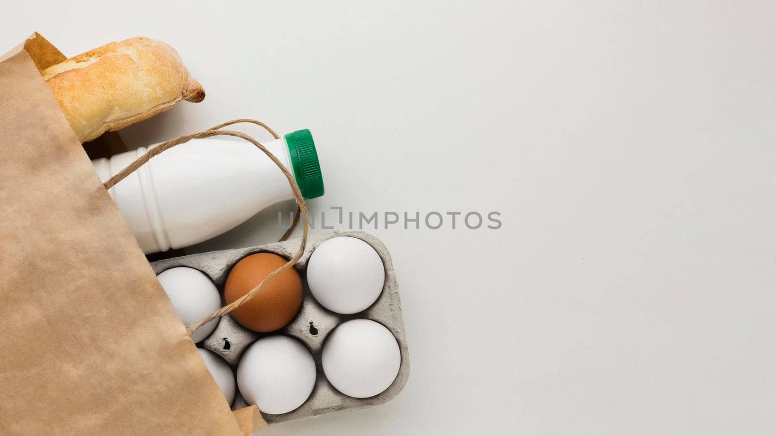 top view organic eggs fresh milk with copy space. High quality photo by Zahard