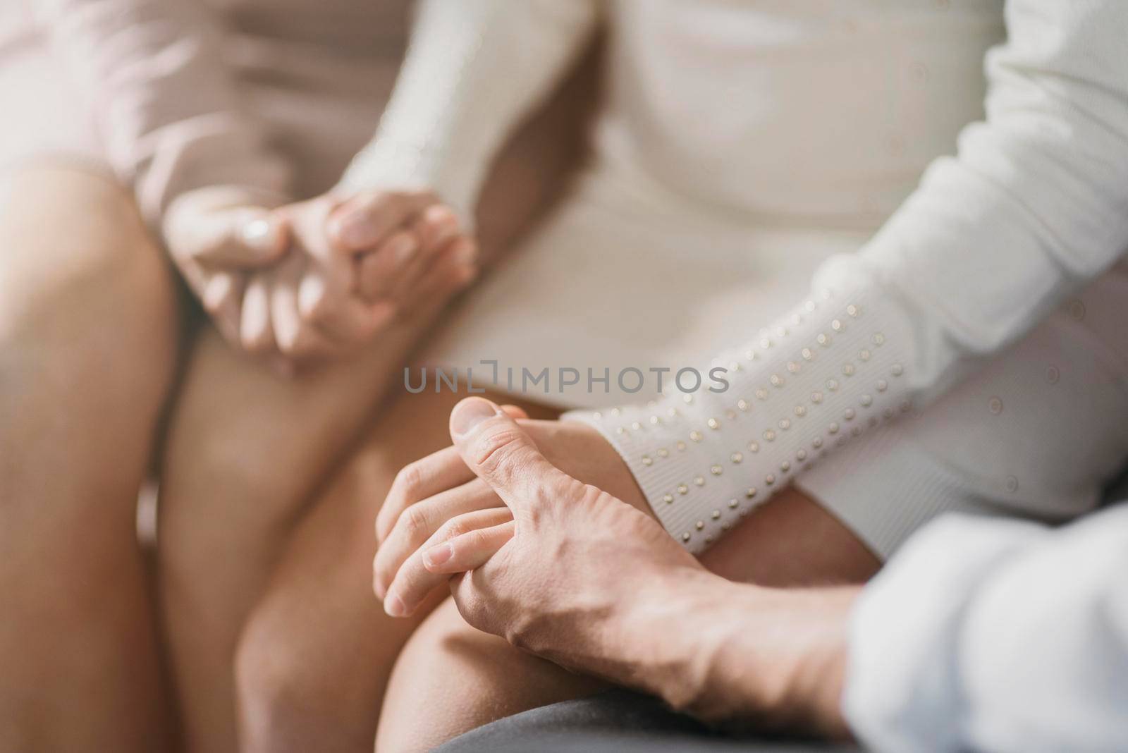 parents daughter praying together close up. High quality photo by Zahard