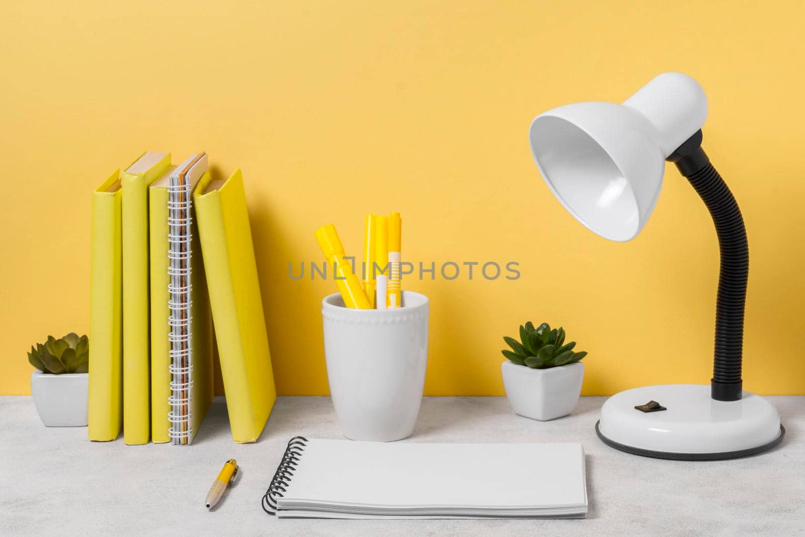 desk lamp notebook arrangement. Beautiful photo