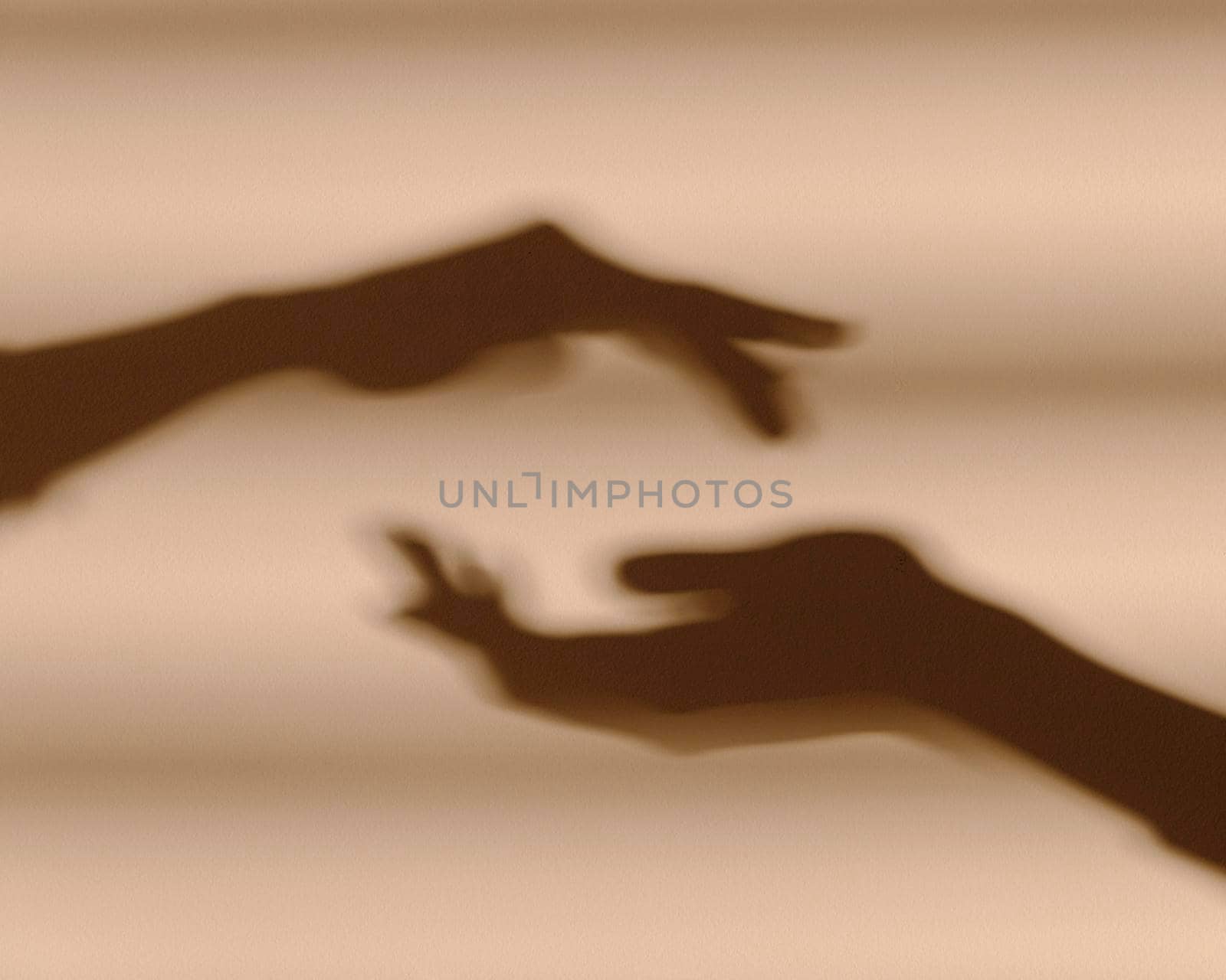 shadows hands white wall. High resolution photo