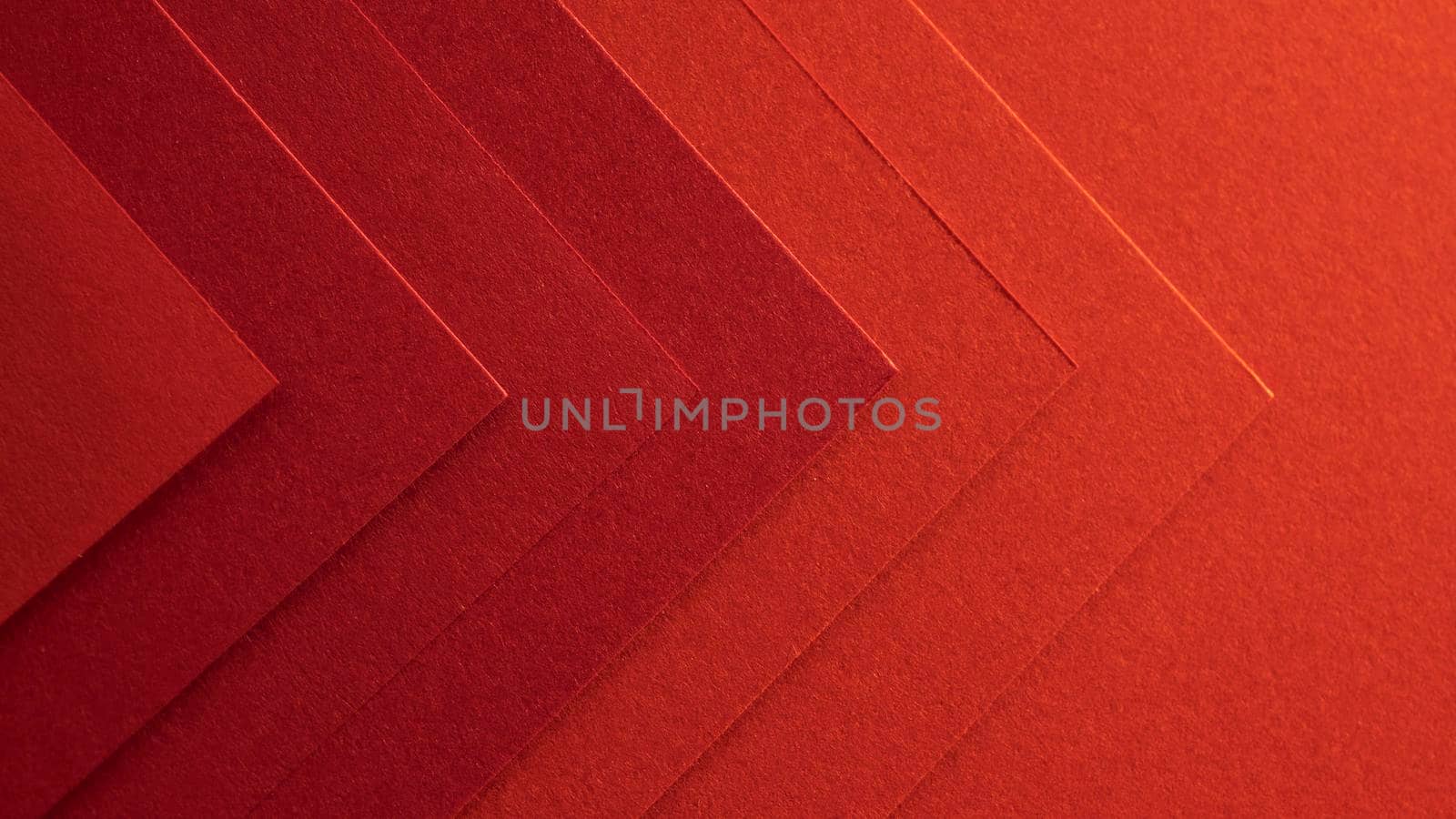 elegant red papers arrow shapes. High resolution photo