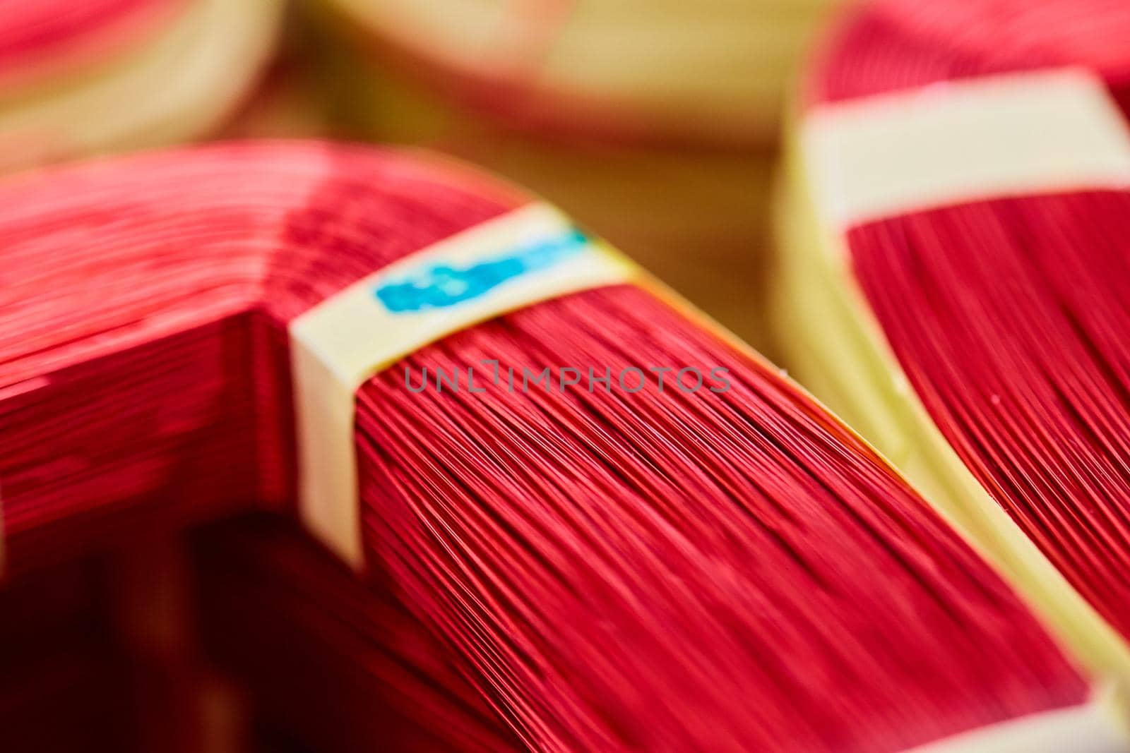 Macro detail of tiny red metal wire bundles by njproductions