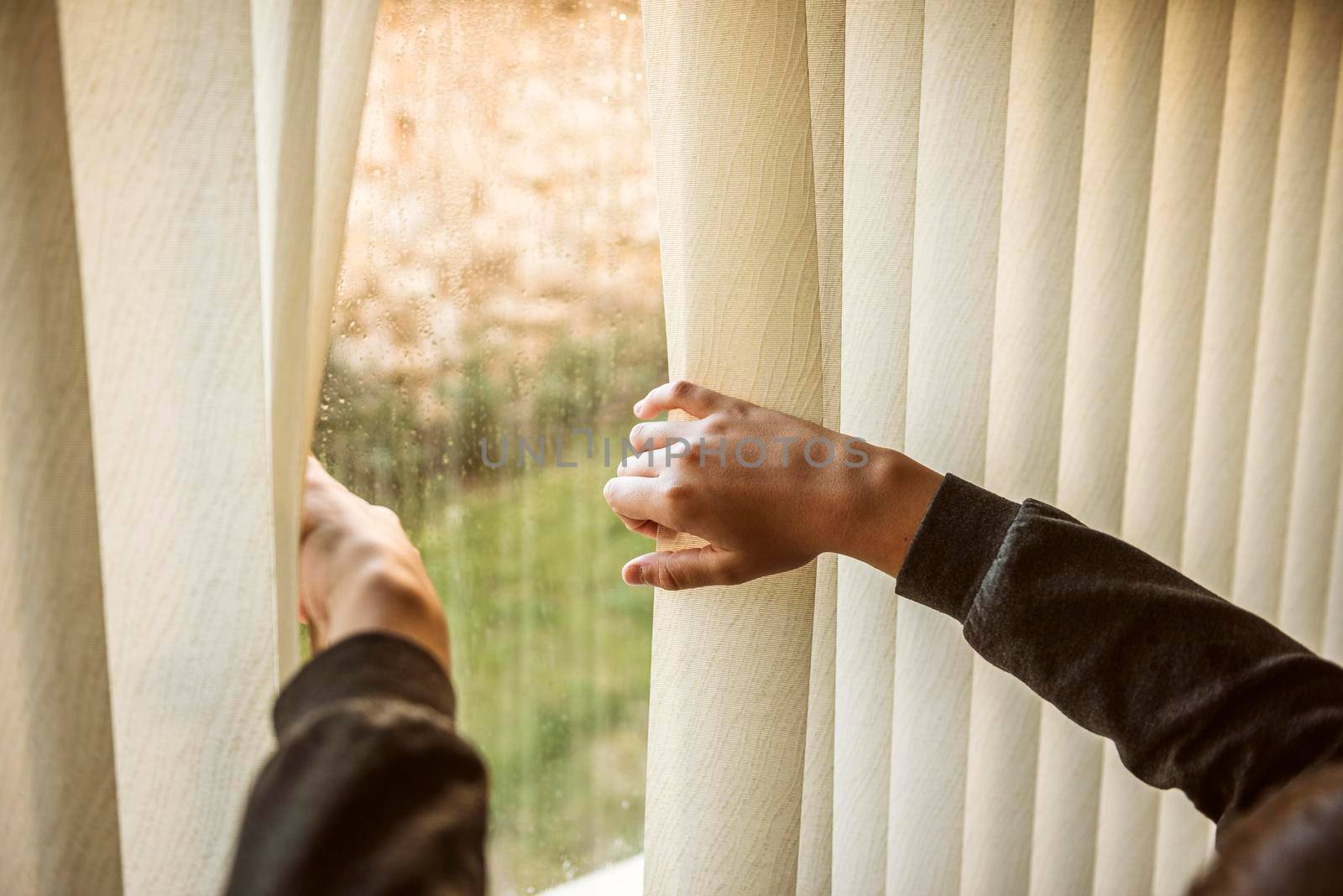 boy looking out window. Beautiful photo